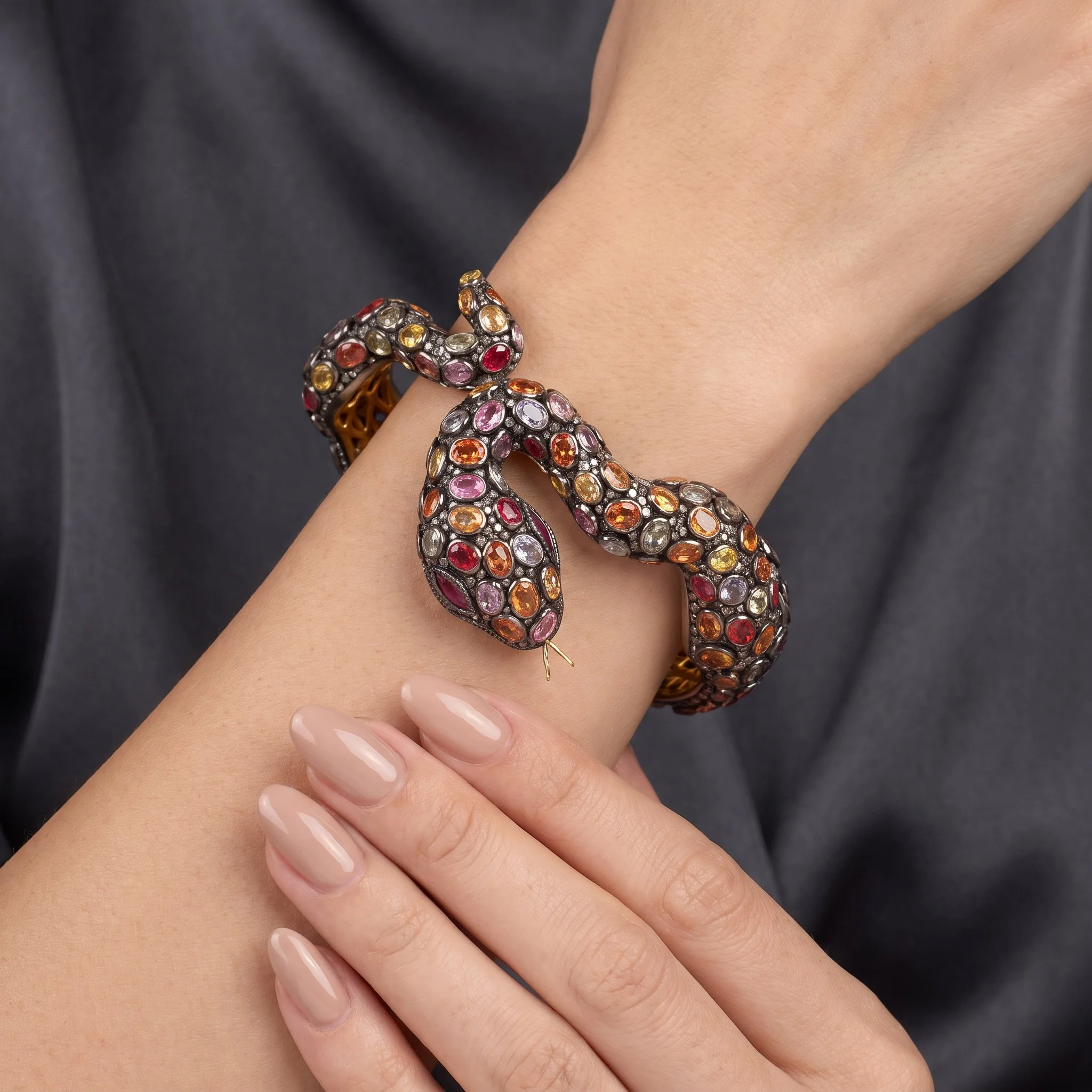 Serpent-Bangle-in-Silver-and-Silver-Gilt-Multi-Coloured-Sapphires-and-Rose-Cut-Diamonds-09-worn-on-wrist.jpg