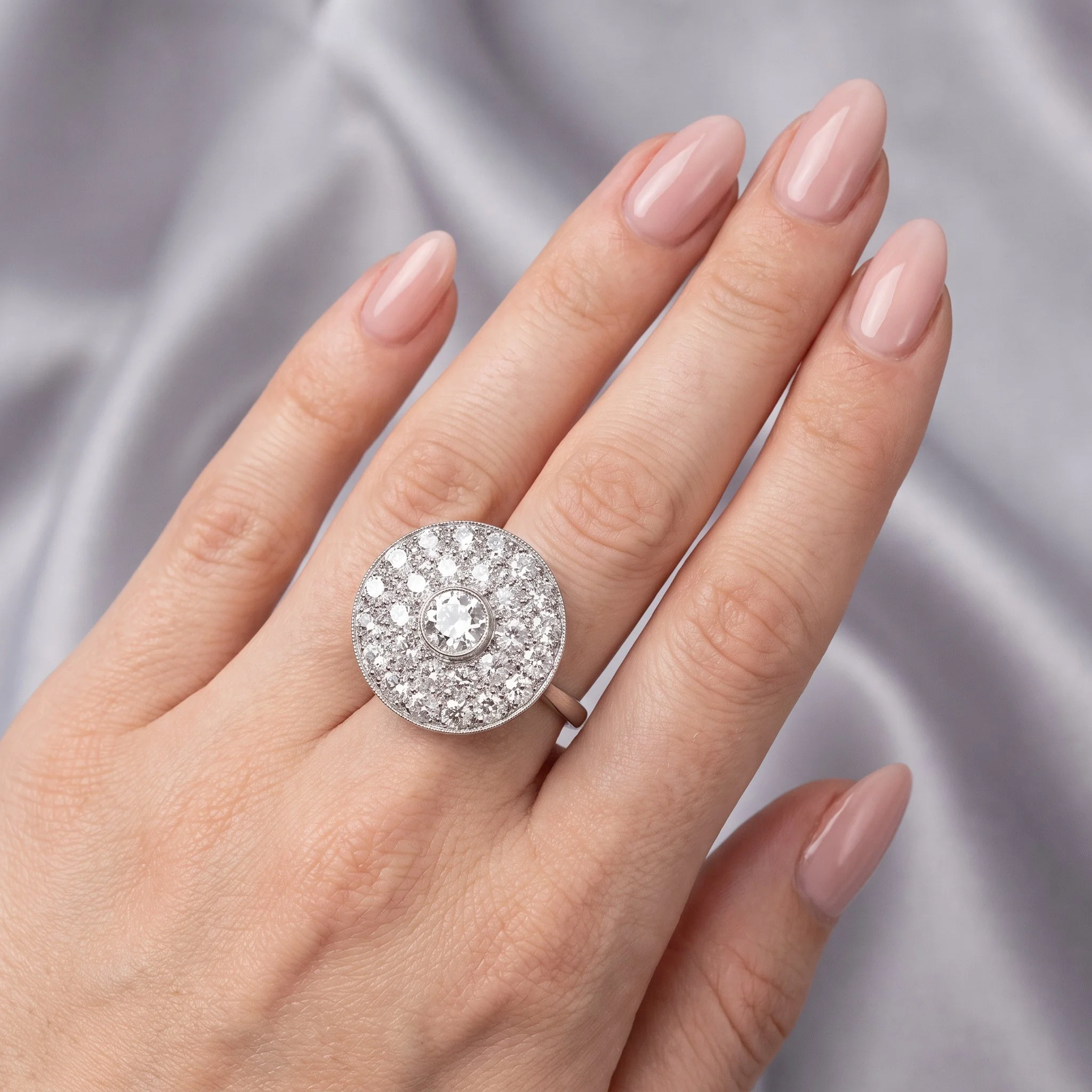 Art-Deco-Platinum-Diamond-Target-Cluster-Ring-2-32-Carats-08-worn-on-hand.jpg