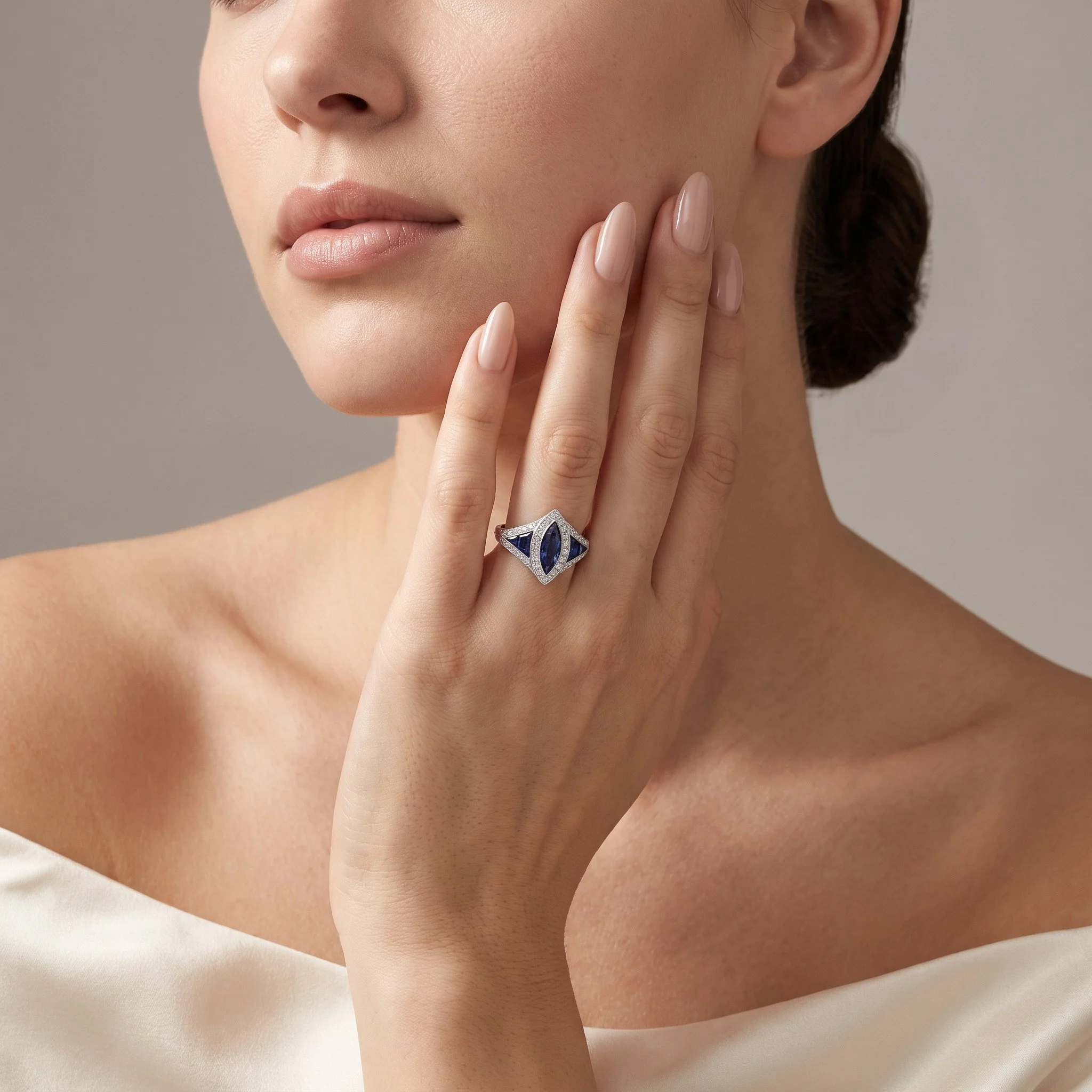 Art Deco platinum marquise sapphire and diamond ring worn on the hand