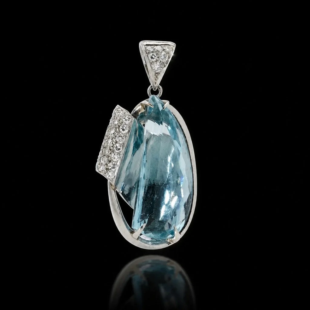 Platinum 14.39 carats half drop shaped Natural Topaz pendant