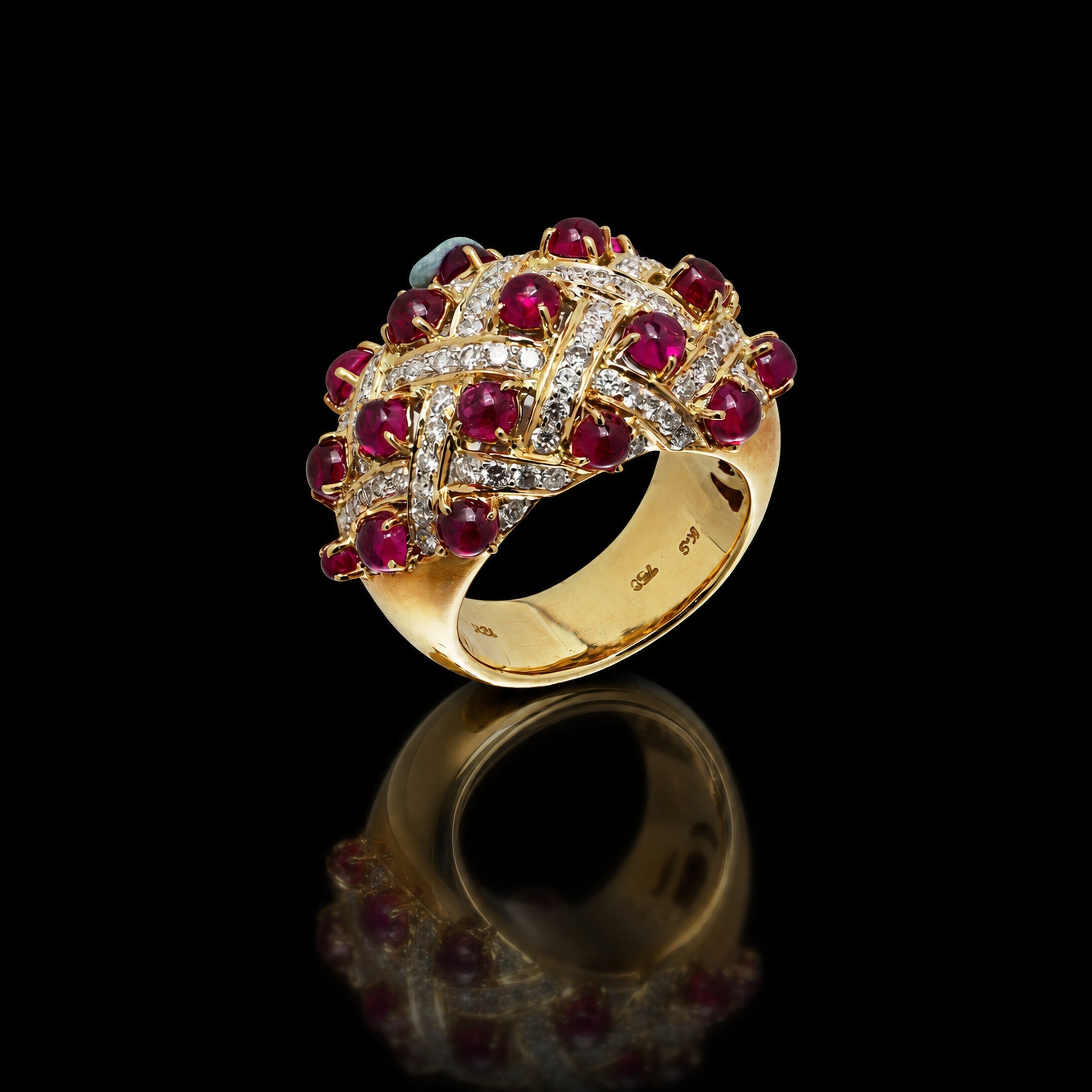 18KT Gold Cabochon Ruby and Diamond Woven Bombé Ring, angled view
