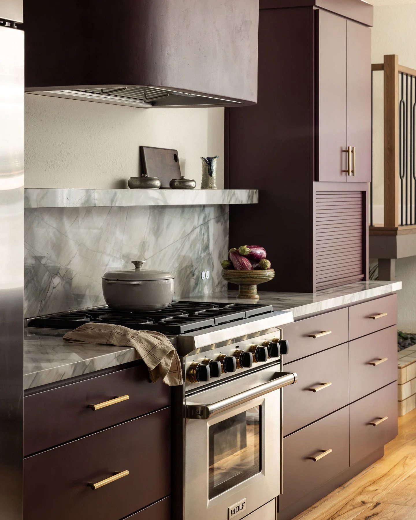 If you&rsquo;re scared of color, this kitchen isn&rsquo;t for you. Plum cabinetry paired with quartzite that looks like a watercolor painting brings the bold. We love clients who don&rsquo;t play it safe.

📸: @stephanie___russo

Stylist: @emilyairos