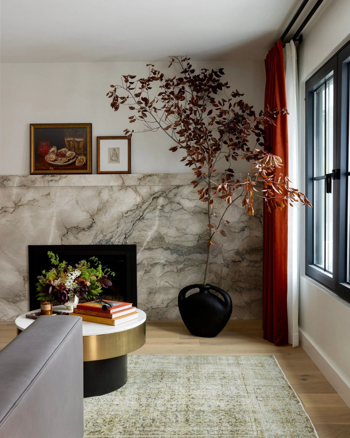 We may have given @whitneyrosefecteau a hard time when she brought in a literal branch.
Turns out, it&rsquo;s the perfect contrast to all that marble and velvet- and made this one of our all-time favorite shots.

📸: @nicolediannephoto
Styling by: @w