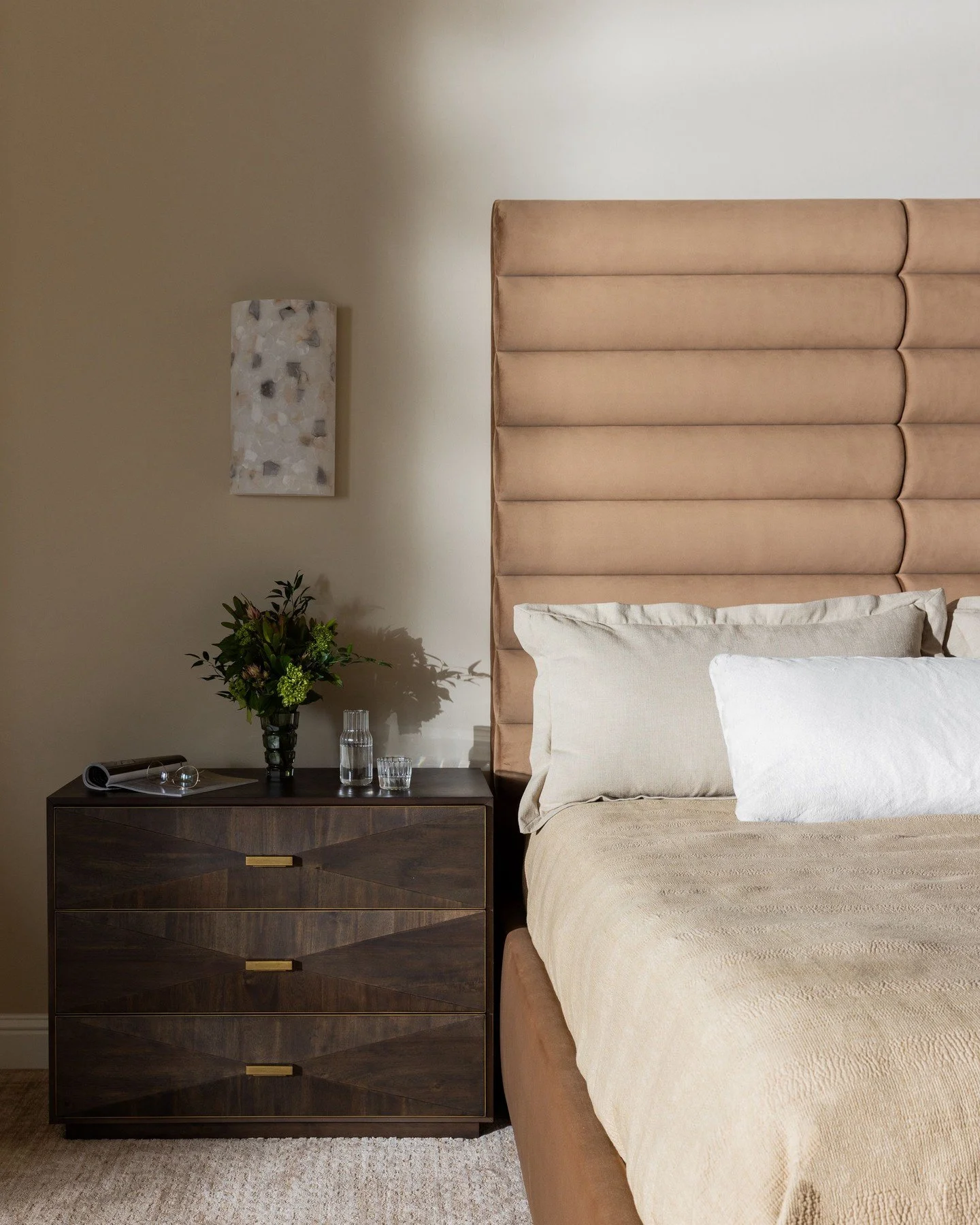 We customized the headboard for extra height, paired it with dark wood bedside tables and alabaster sconces, then layered in soft linen and velvet to create a space that makes you want to stay in bed a little longer 🤎
📸: @nicolediannephoto
Styling 