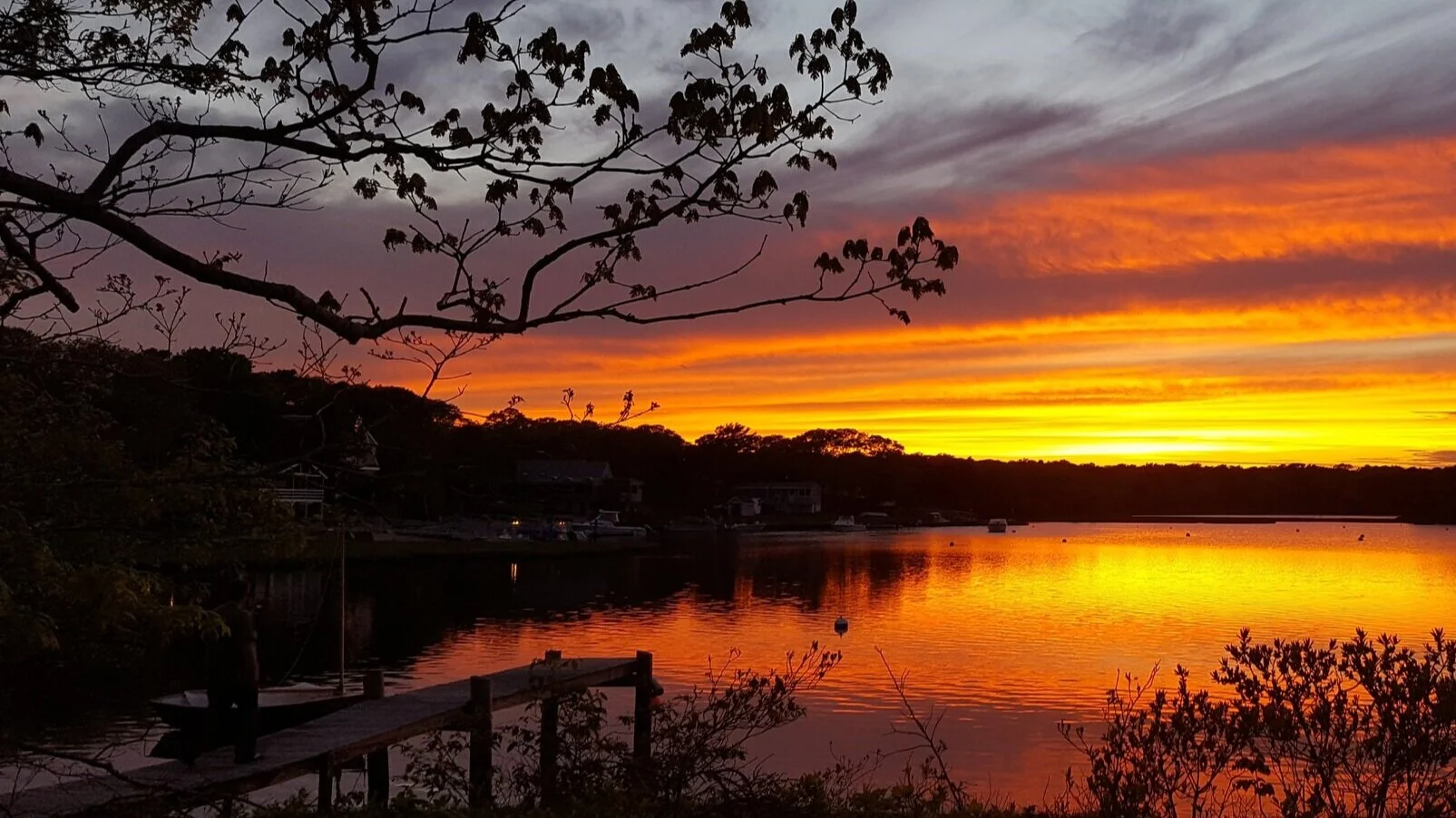 A dock at sunset