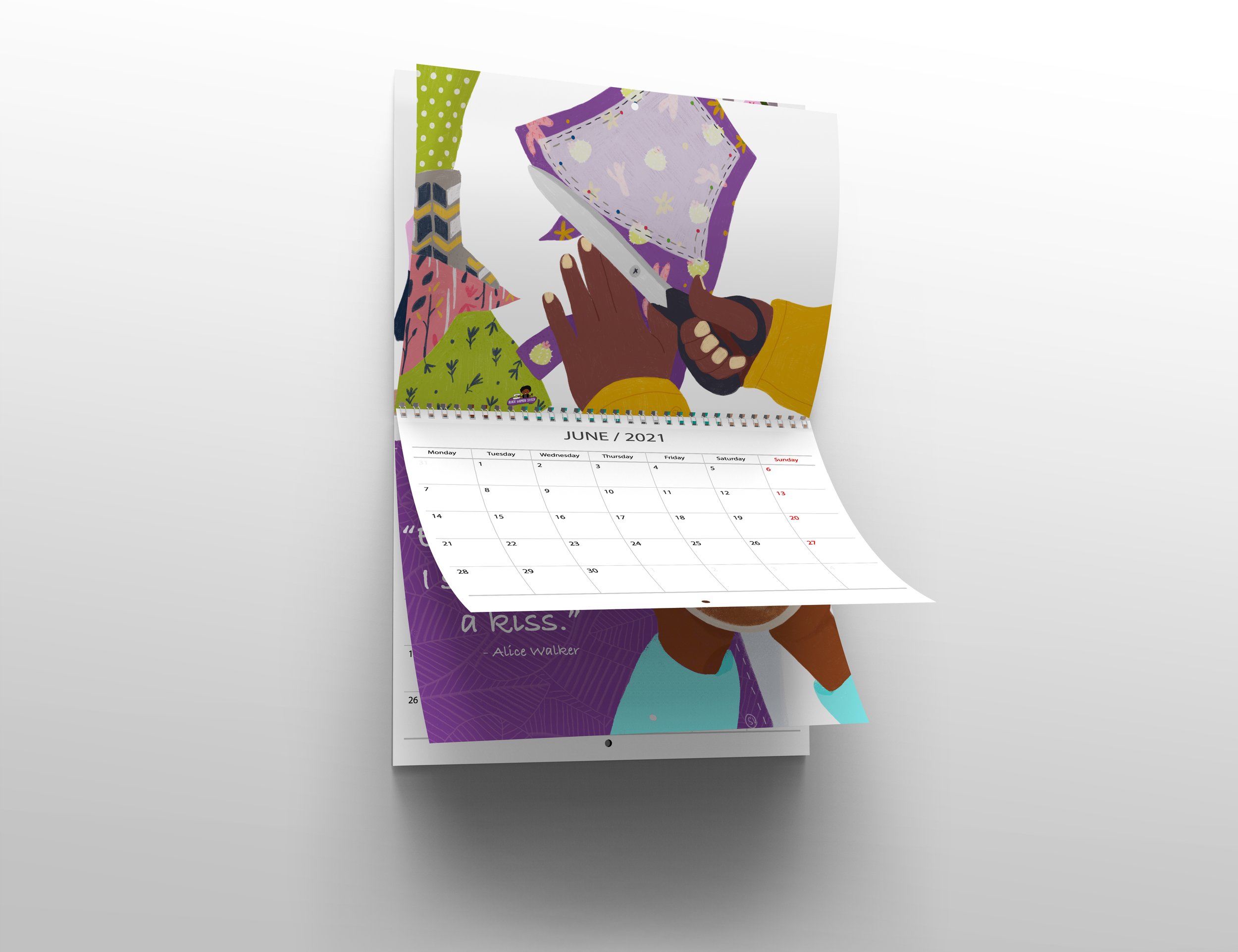 Wall calendar displaying June 2021 with an illustration of hands using scissors.