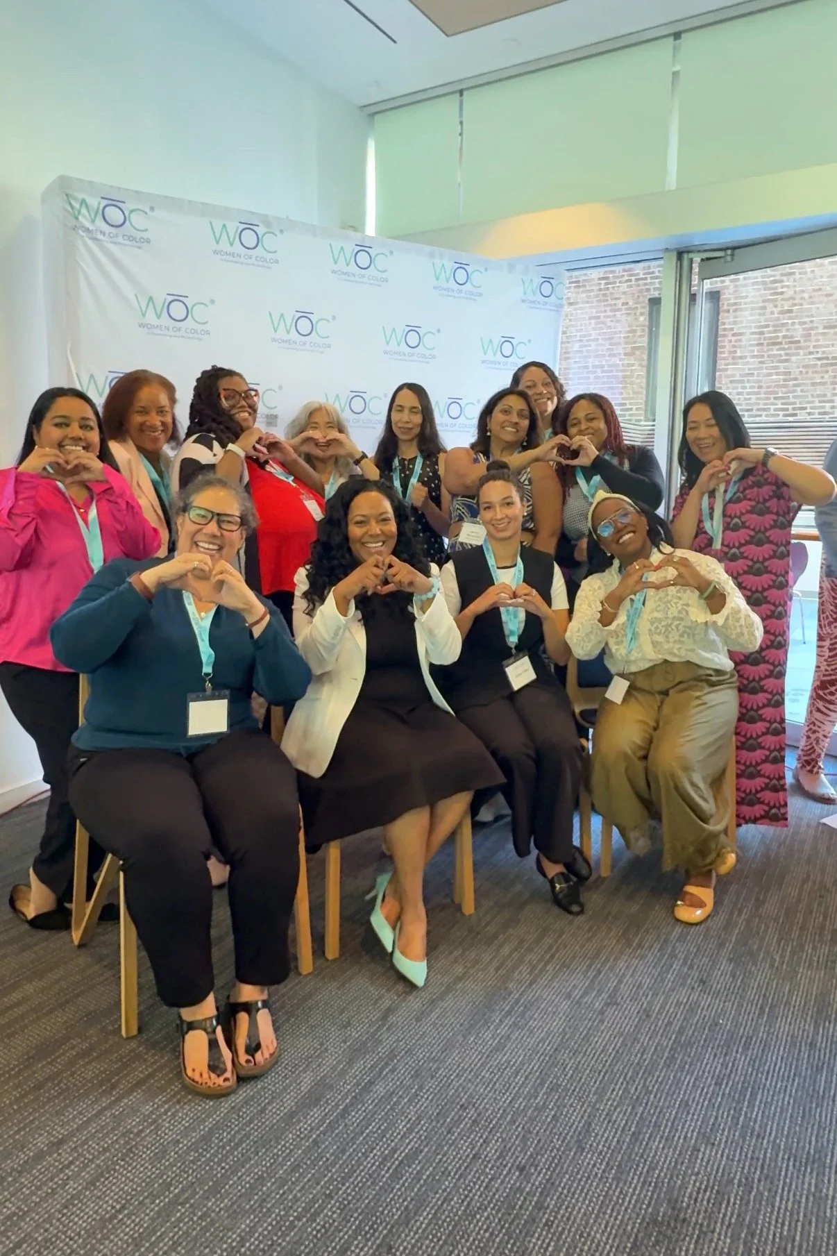 2026-woc-symposium-session-speakers-group-photo.JPEG