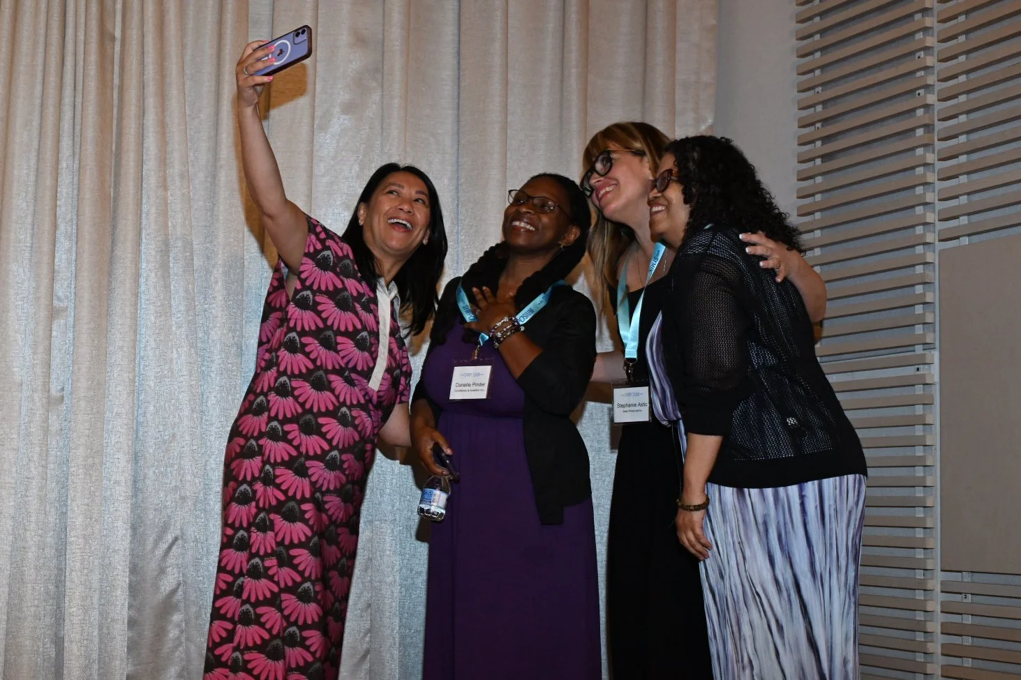 Session speakers taking a group selfie.
