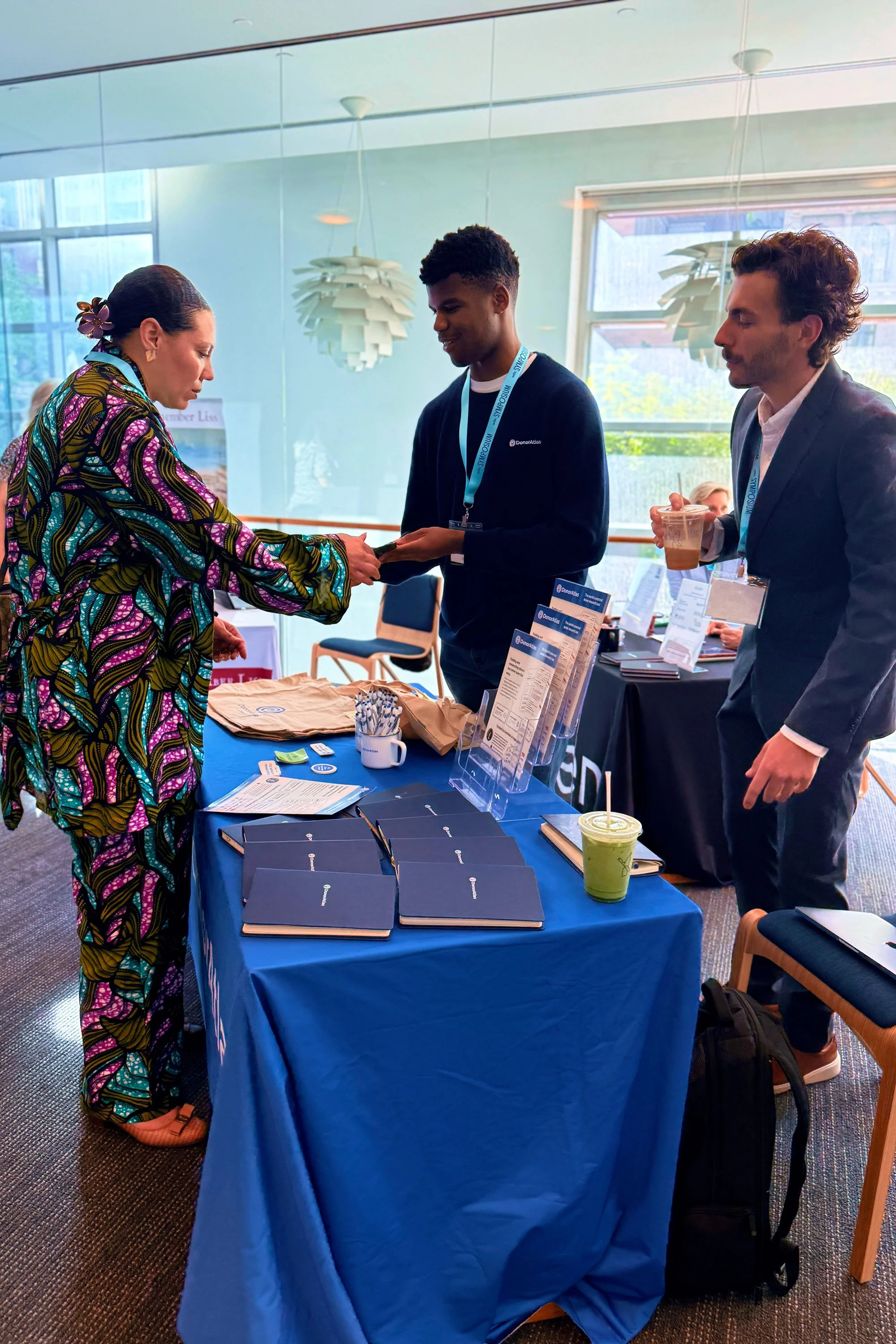 2026-woc-symposium-donor-atlas-booth.JPEG