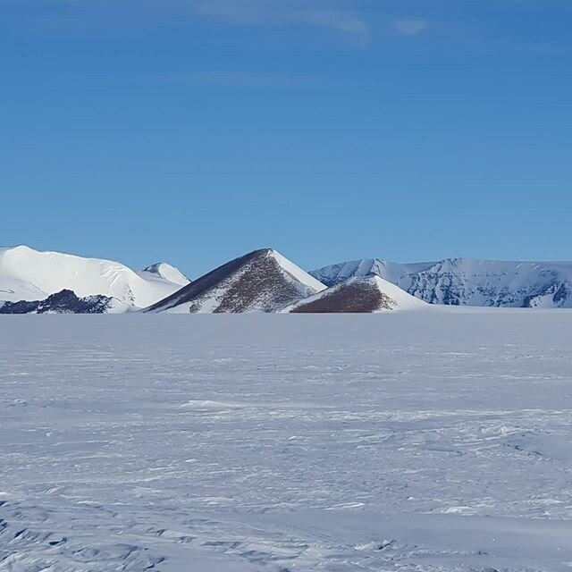 Nunataks, exposed mountain tops peeking out of an ice field - found them a highly welcome navigation aid in the predominantly plain white. 
They can also provide habitat for isolated life in an otherwise inhospitable environment

#isolation #nunatak 