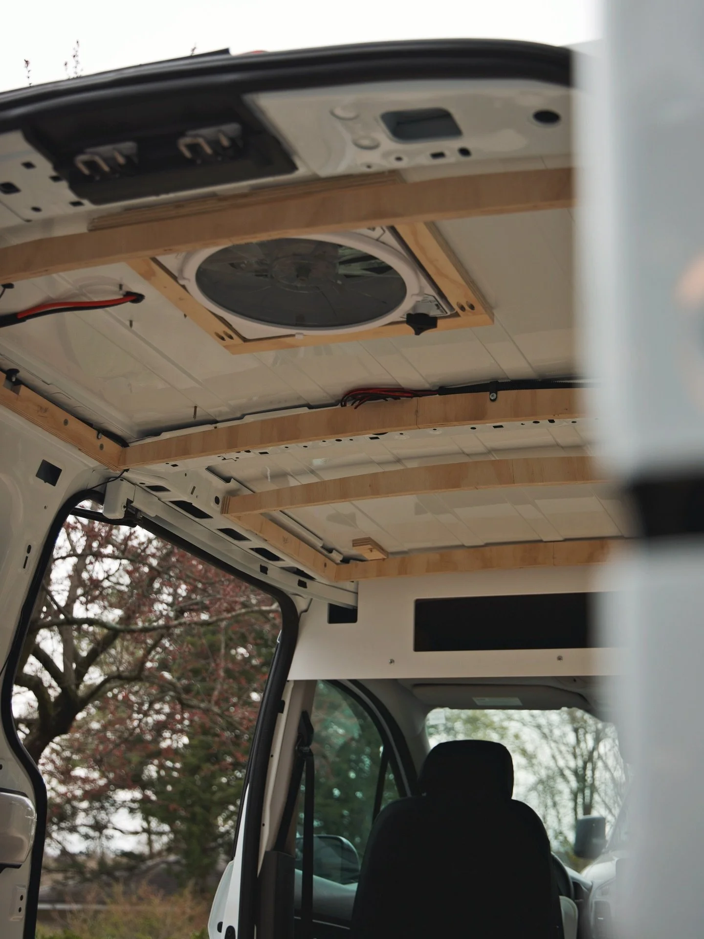 I like to add my own framing when I can.  This allows me to add support for the ceiling right where I want, instead of relying on the factory ceiling cross members.
&bull;
Briarwoodvans.com