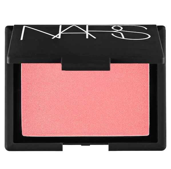 Nars Orgasm Blush - Photo Credit: Sephora For blush she’s using one of the most well known colors from Nars, which is Orgasm blush. The blush is a shimmery peachy pink color and Noor likes it because it makes her cheeks look rosy and glowy. The price for this blush is $39 and has 0.28 oz, so it’s 8 grams.
