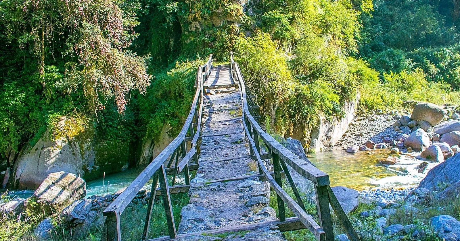 Rickety bridge across a river helps people accept uncertainty.