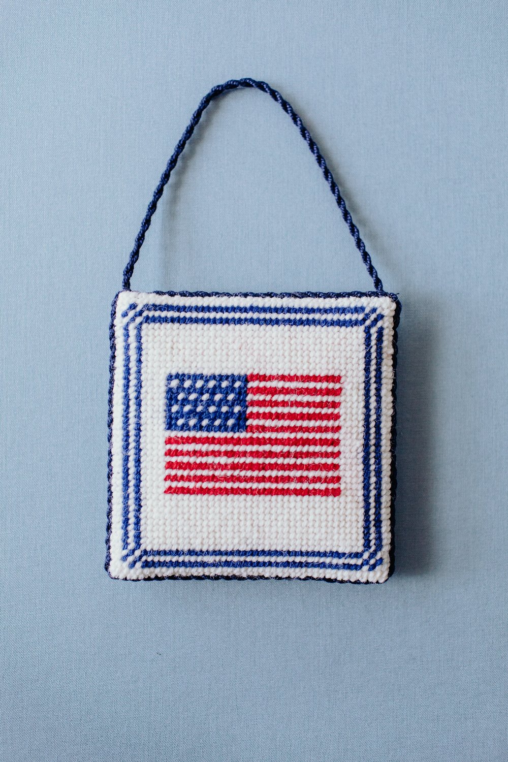  Flag Canvas finished as an ornament with twisted cord.  