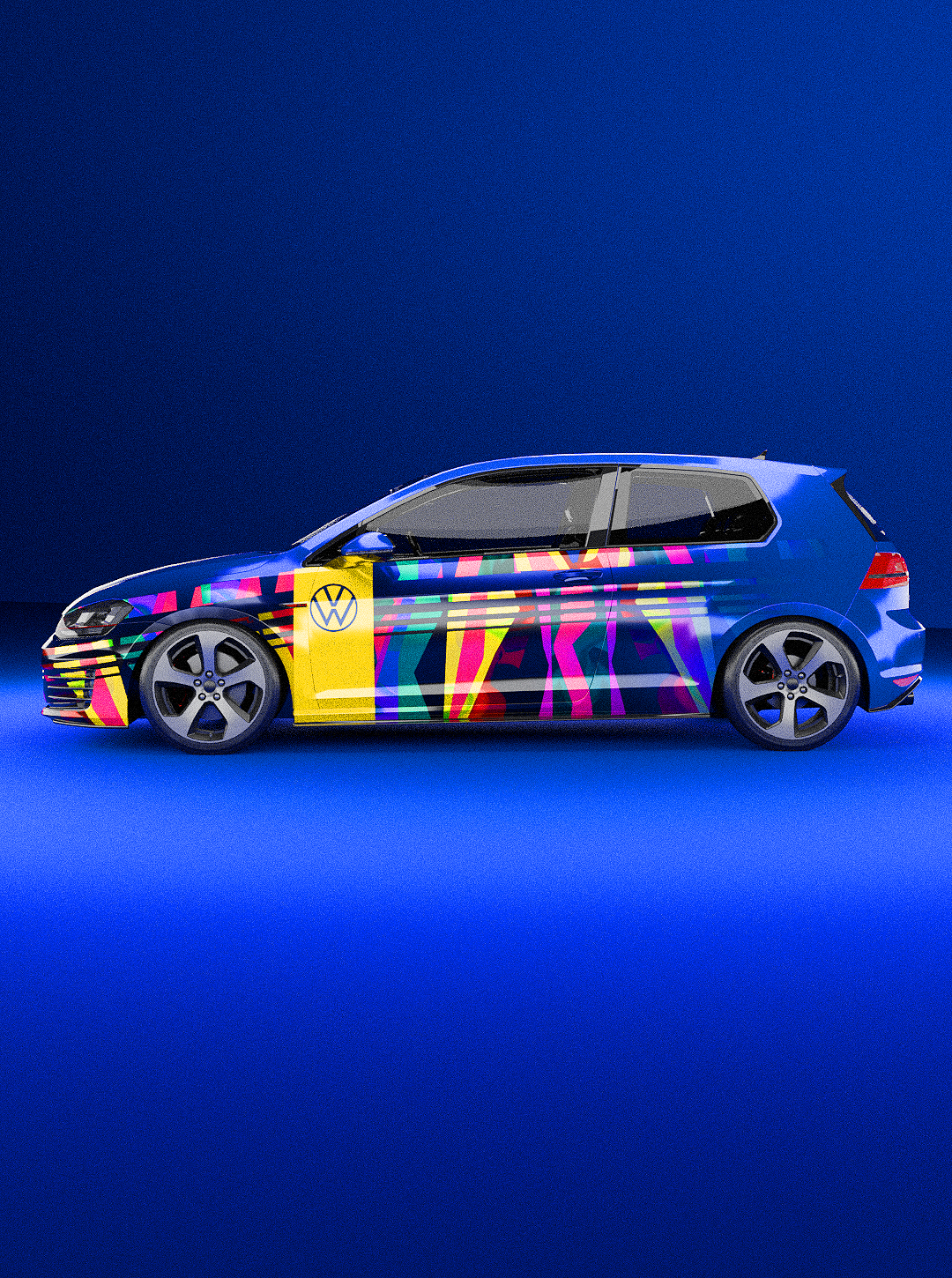 A Volkswagen car with a colorful, abstract wrap design, set against a solid blue background.