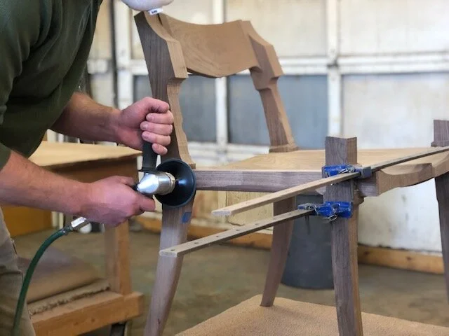 Handcrafted wooden furniture making in traditional wood workshop classes using hand tools