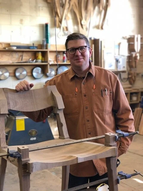 Wood workshop classes teaching custom woodworking with handcrafted chair