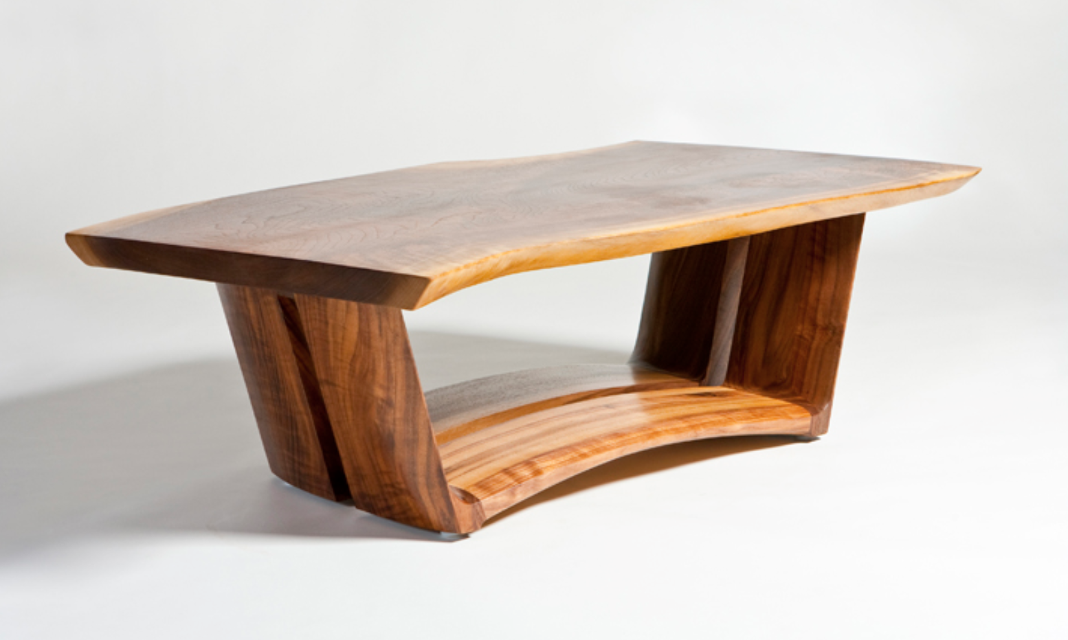 Custom furniture coffee table with handcrafted live edge design in solid wood