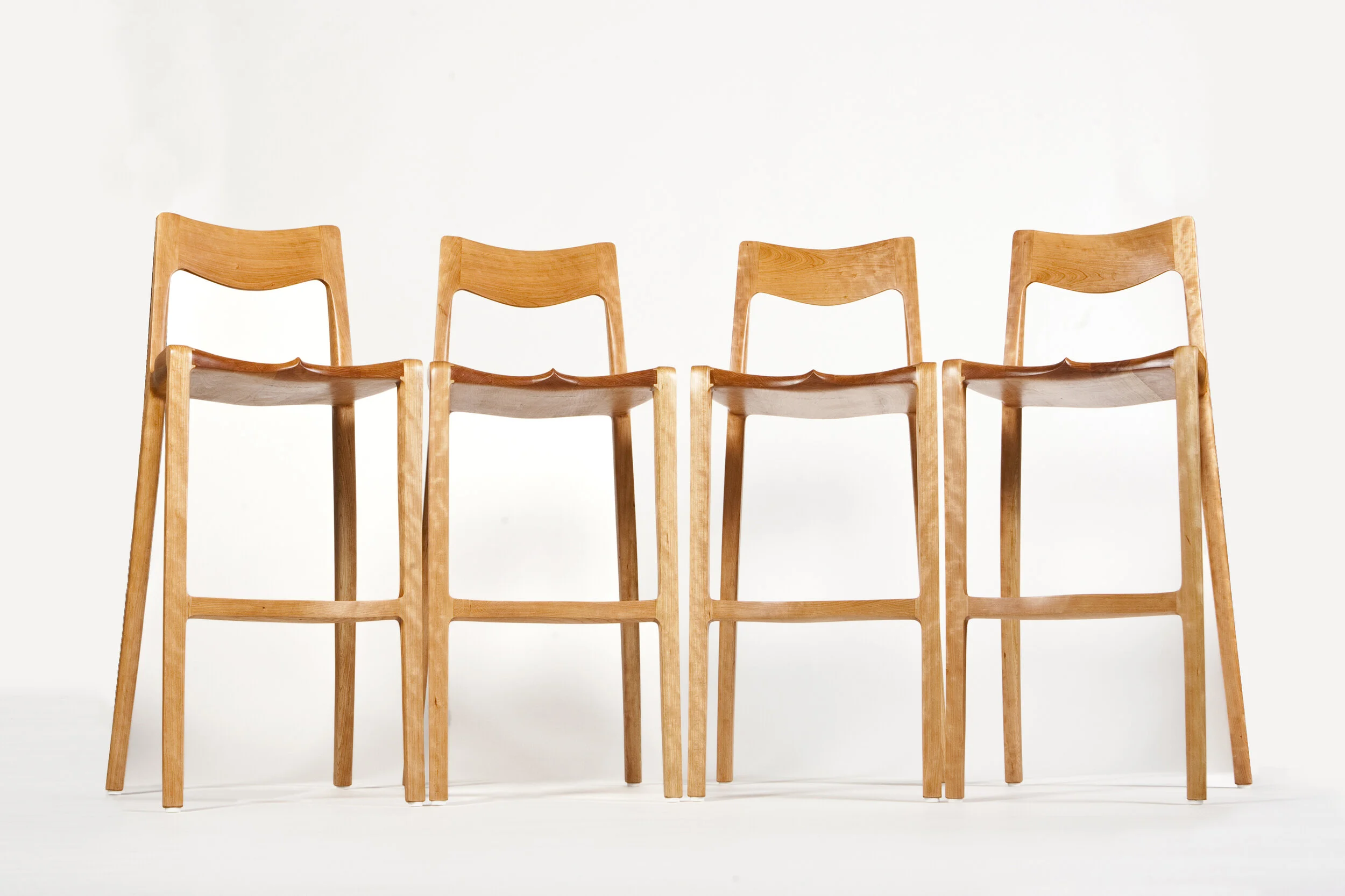 Handmade bar stools by Hutchinson Furniture showcasing custom furniture in Omaha, Nebraska.
