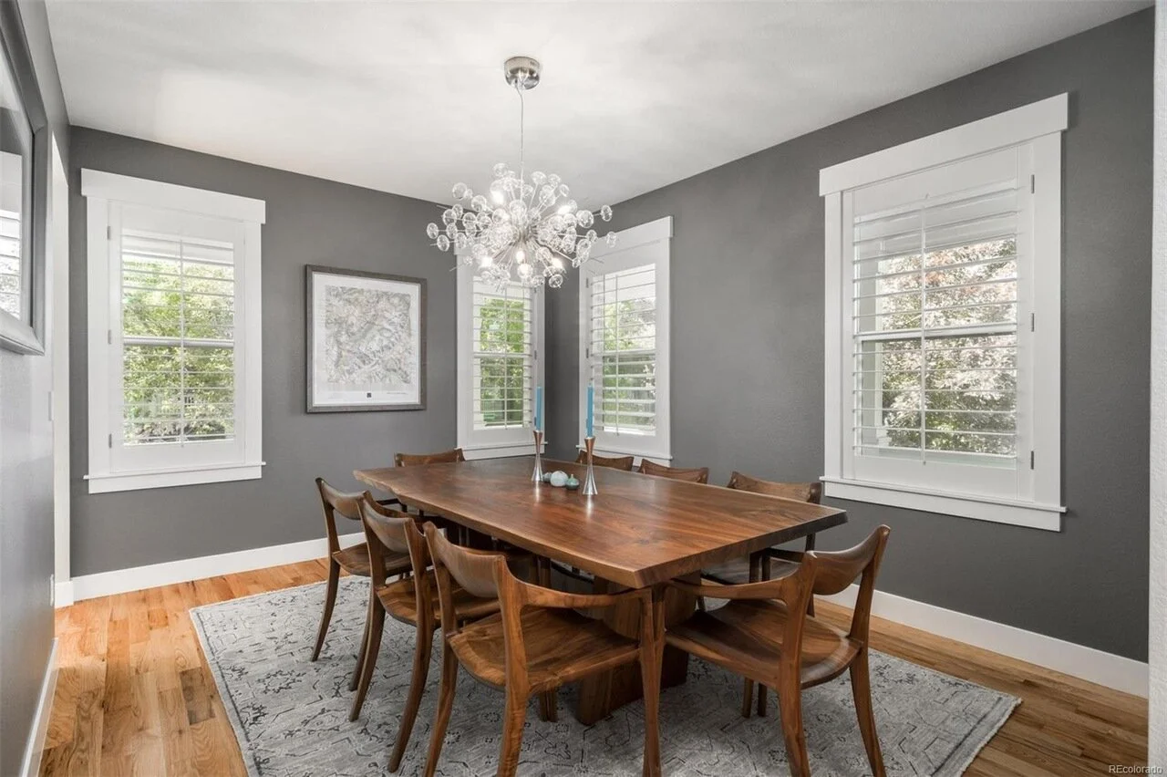 Custom furniture by Ethan Hutchinson featuring handcrafted dining table in luxury space
