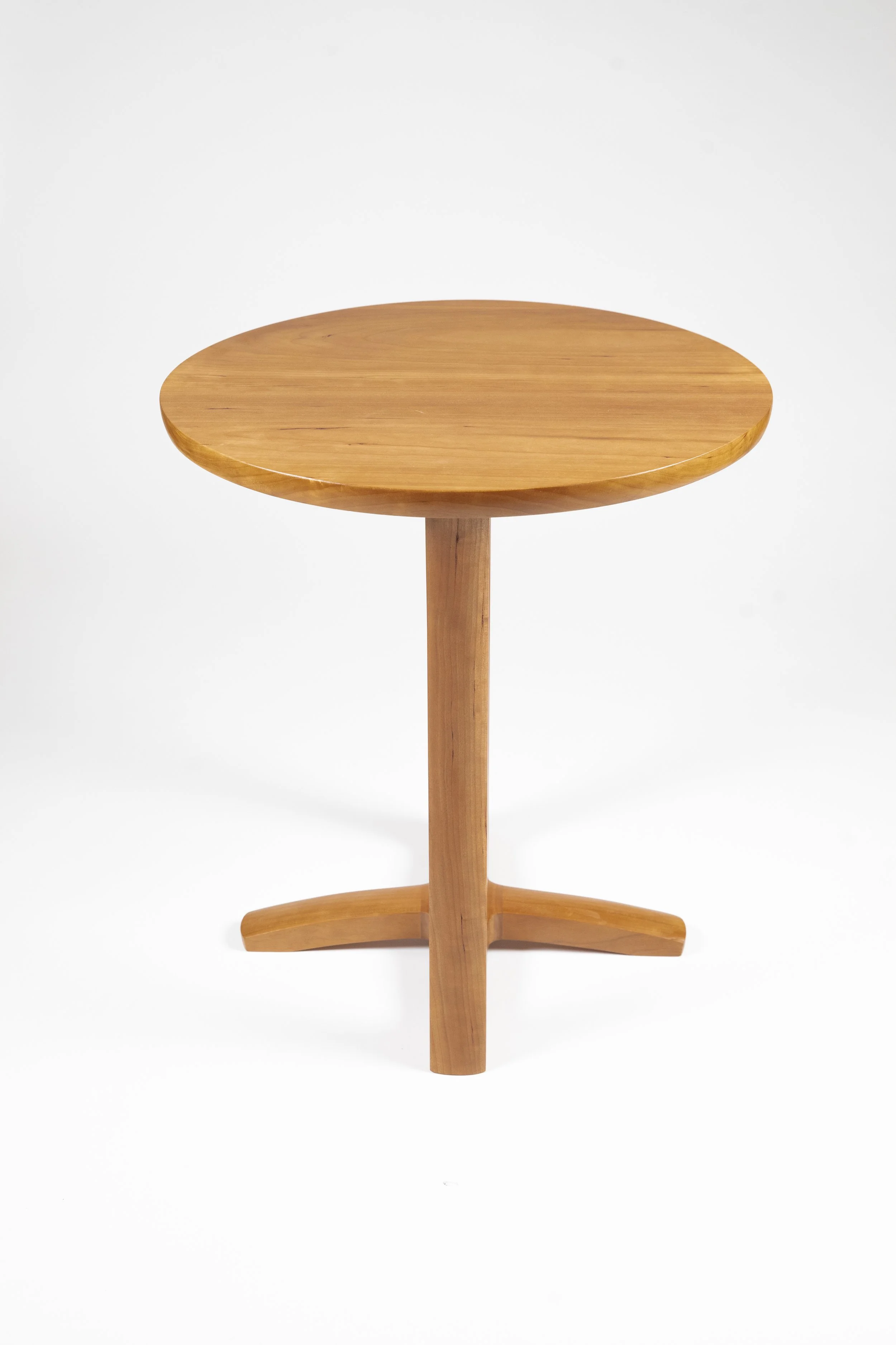 Handcrafted custom wood side wood table with round top in furniture store collection