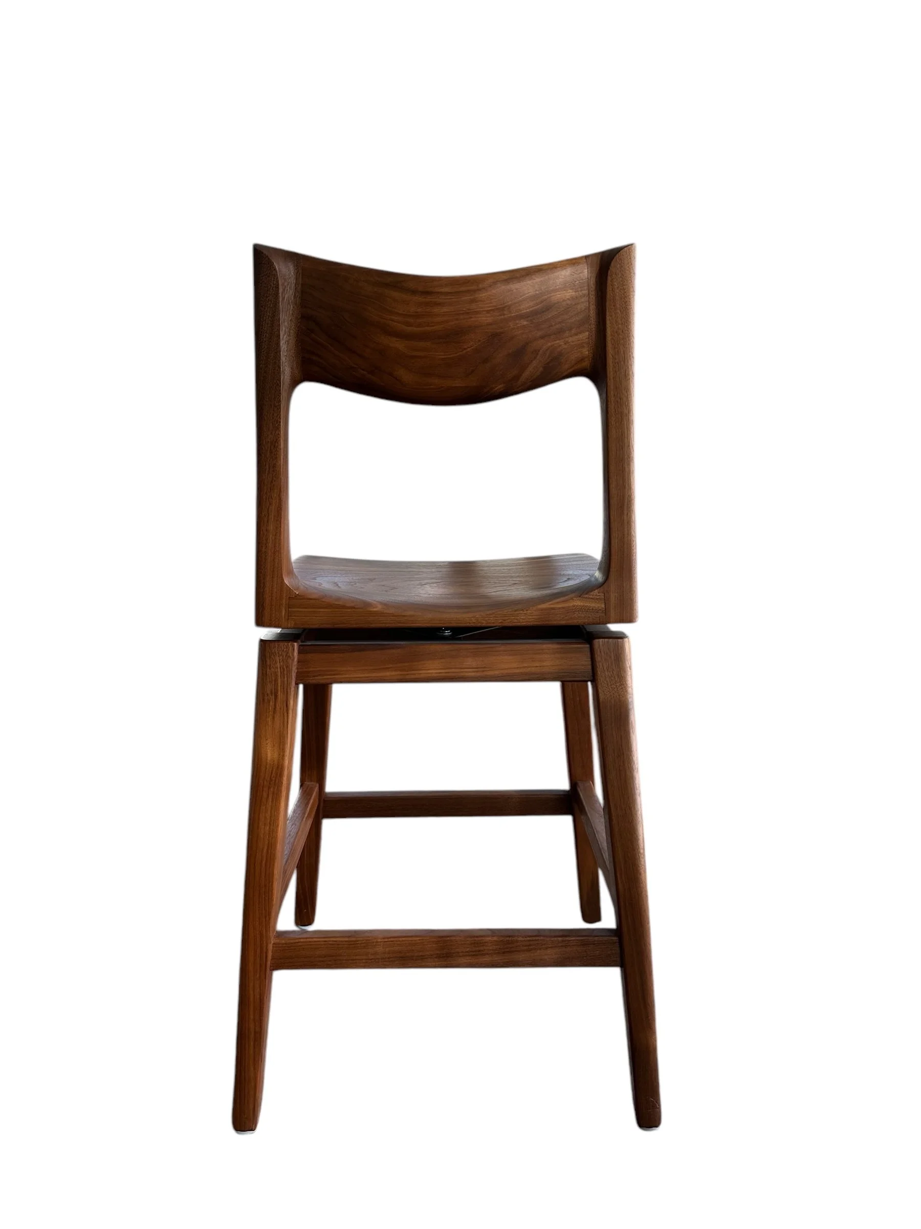 Custom wood swivel seat stool with curved backrest in handcrafted furniture design in Hutchinson products furniture store