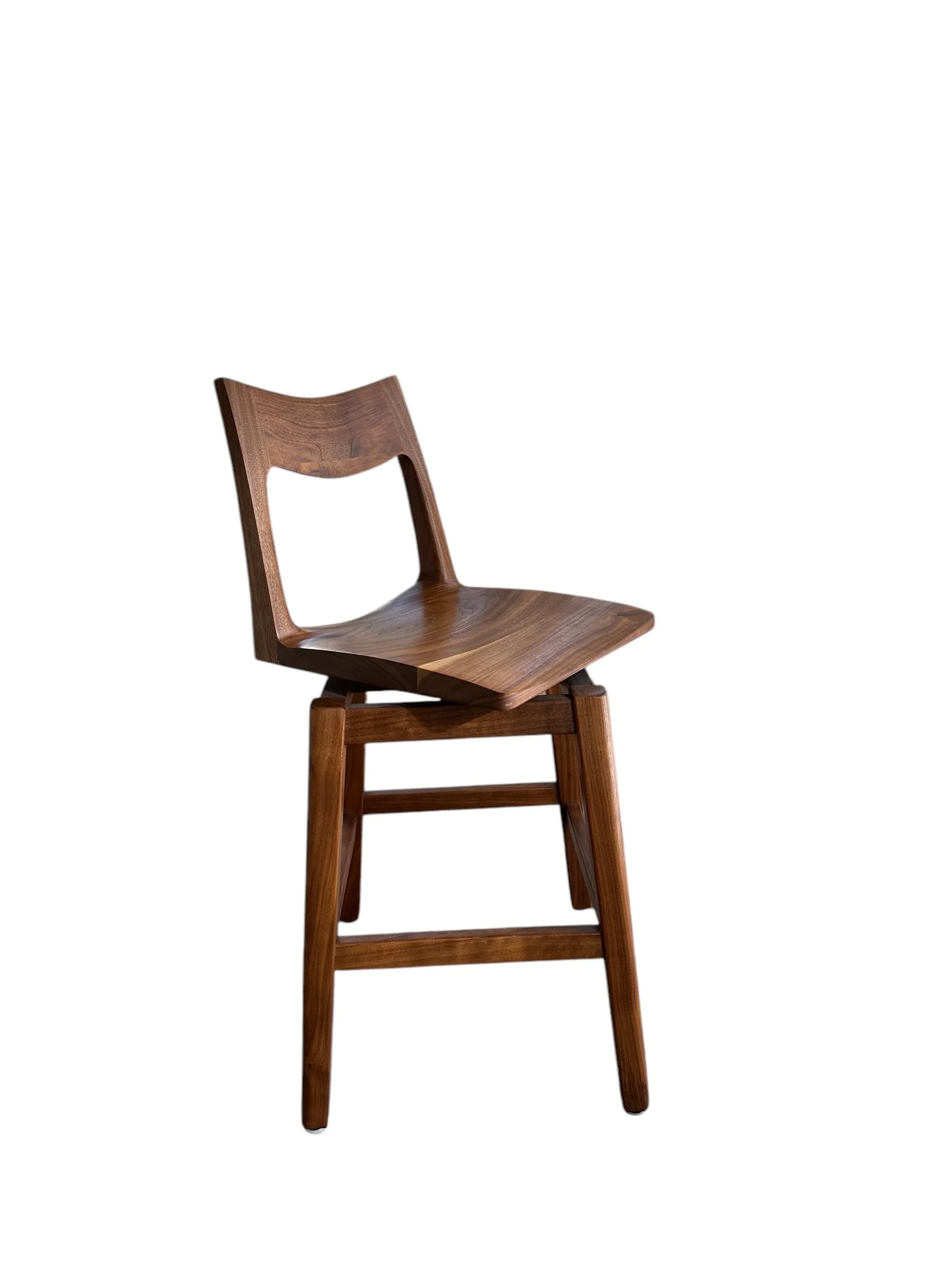 Handcrafted custom wood swivel seat stool showing side profile and solid wood construction in Hutchinson products furniture store