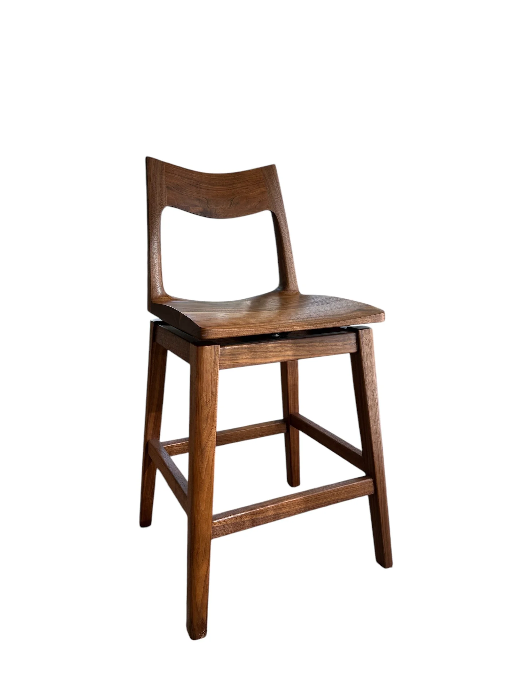 The Swivel Seat Stool by Ethan Hutchinson custom wood furniture worker, Signature Line handcrafted wood furniture collection.