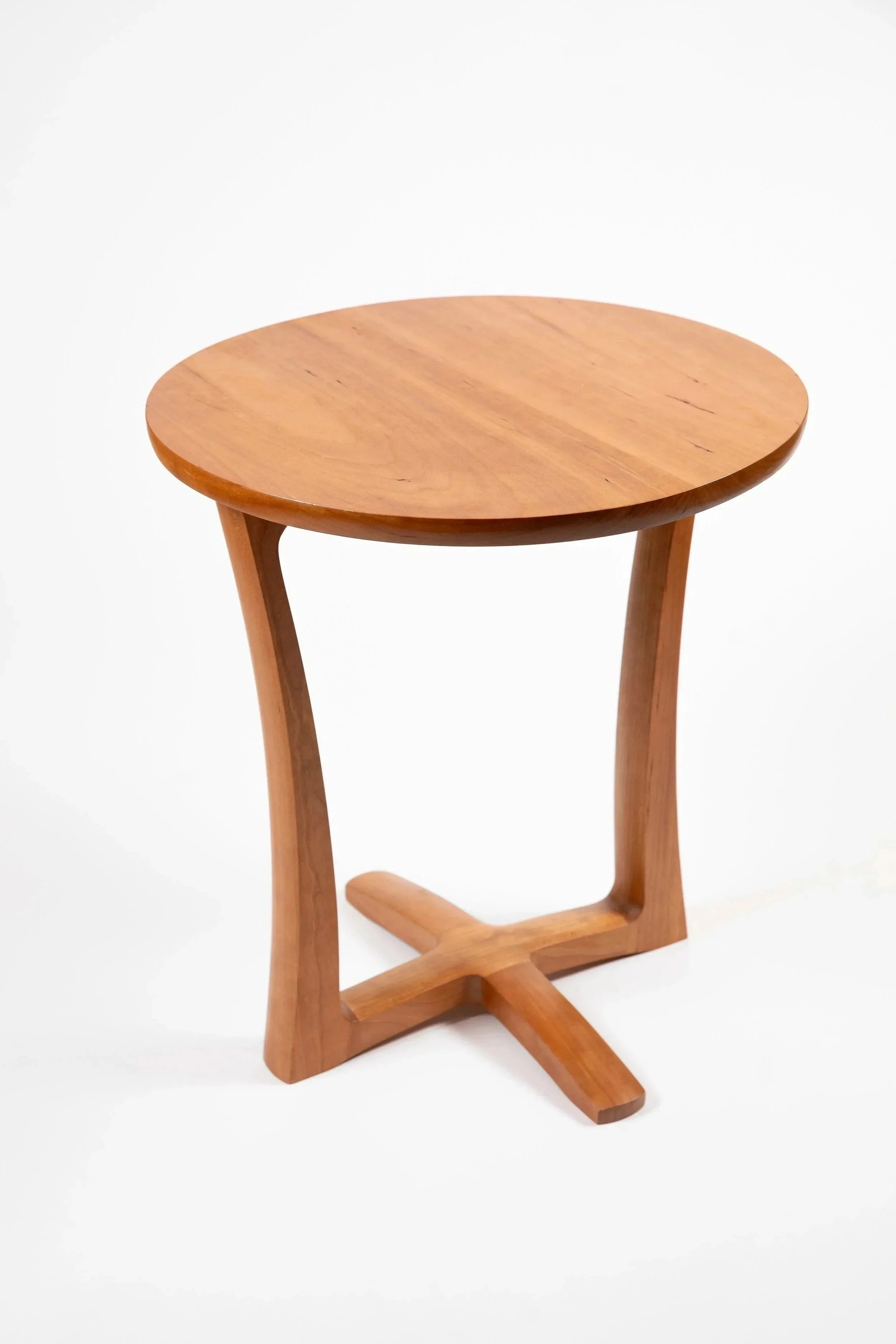 Custom wood furniture side table with handcrafted design in modern style