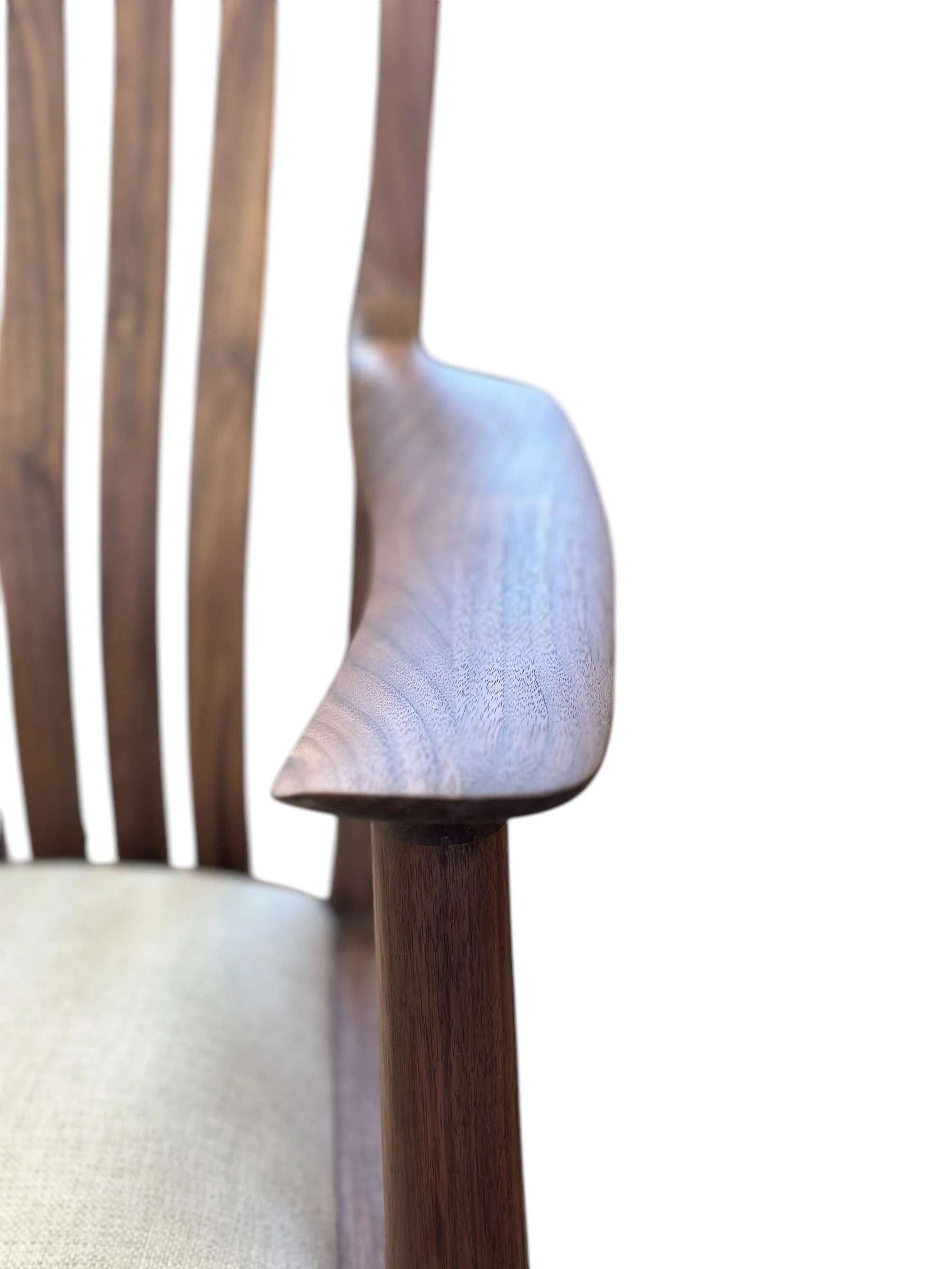 Close-up of custom bespoke furniture rocker chair armrest with smooth handcrafted finish in online furniture shop