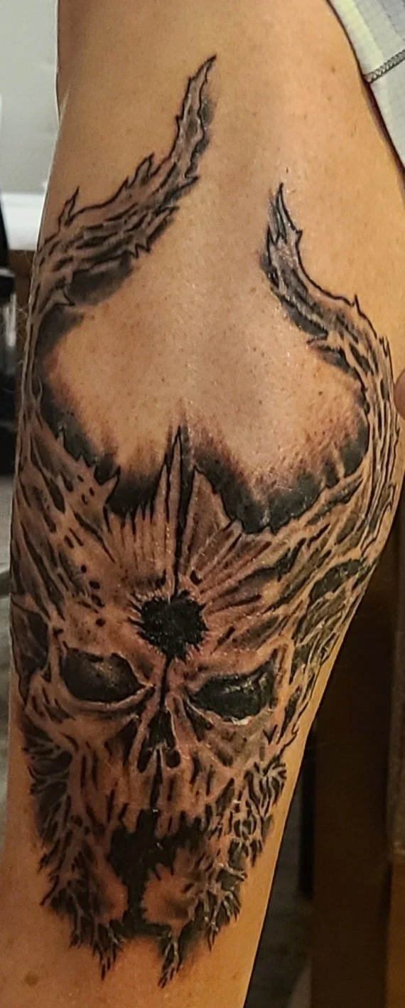 Triptych Wood Skull 01.jpg