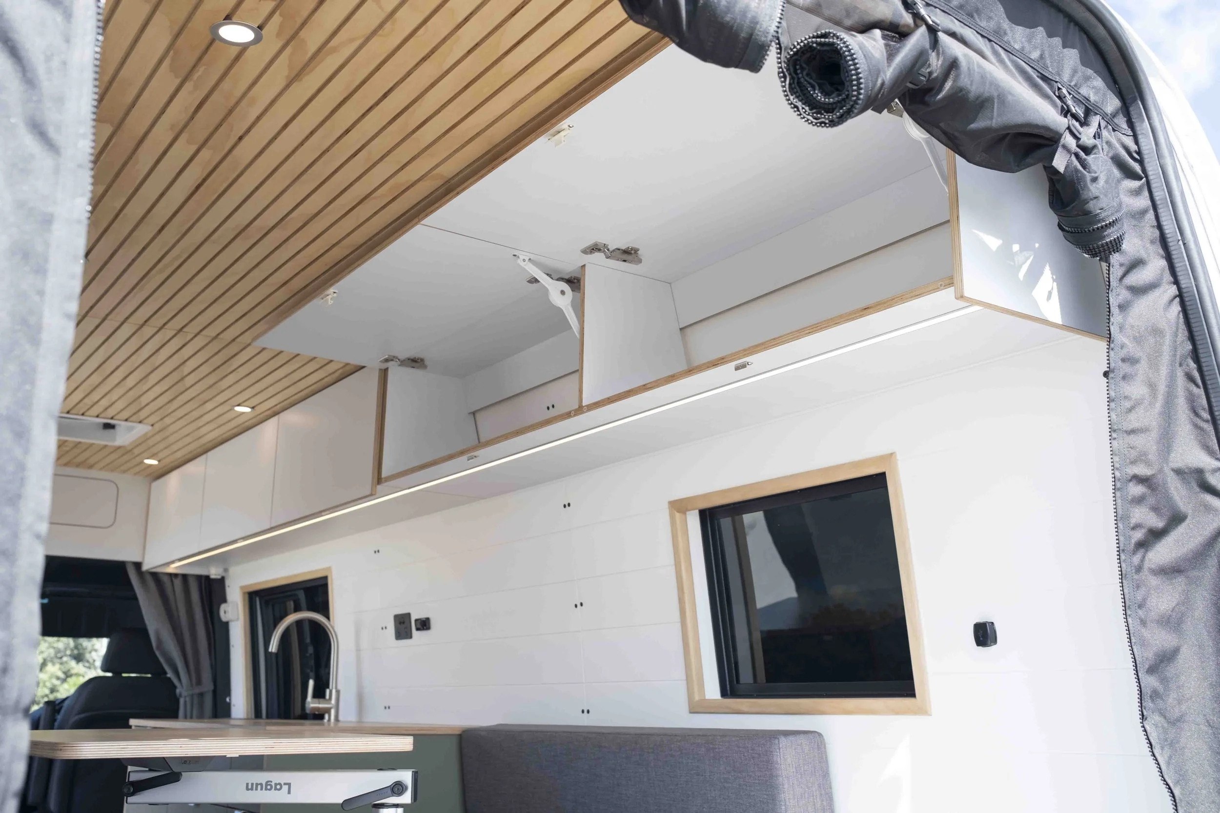 mercedes-sprinter-top-cupboards-open-turnkey-campervan-conversion-matt-and-dans-campervans.jpg