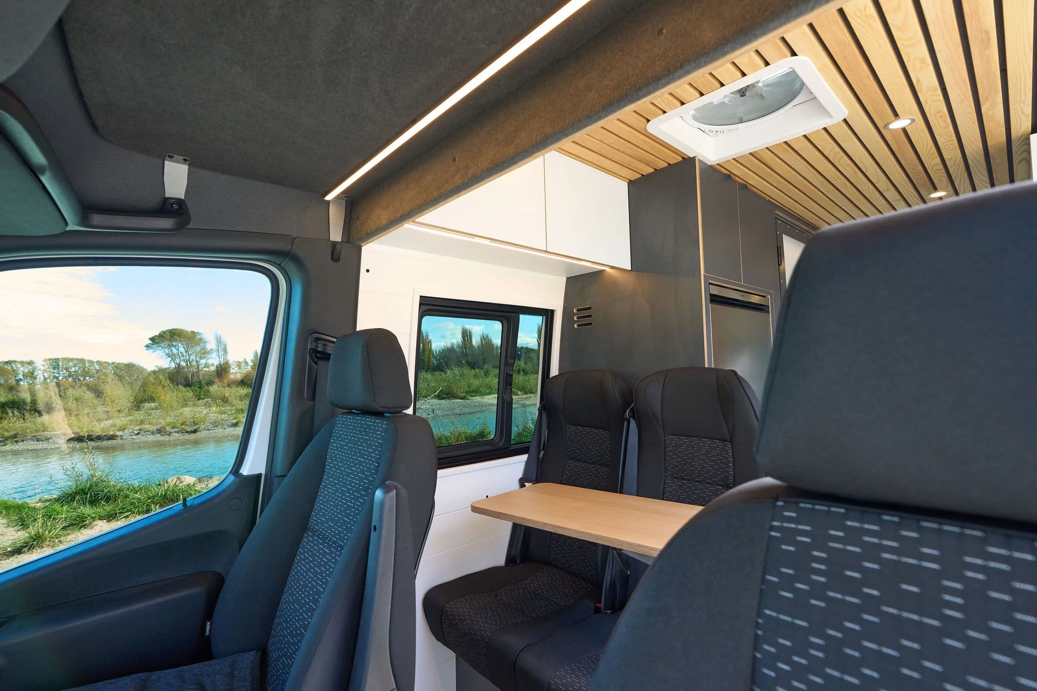 front-seats-camper-conversion-sprinter-matt-and-dans.jpg