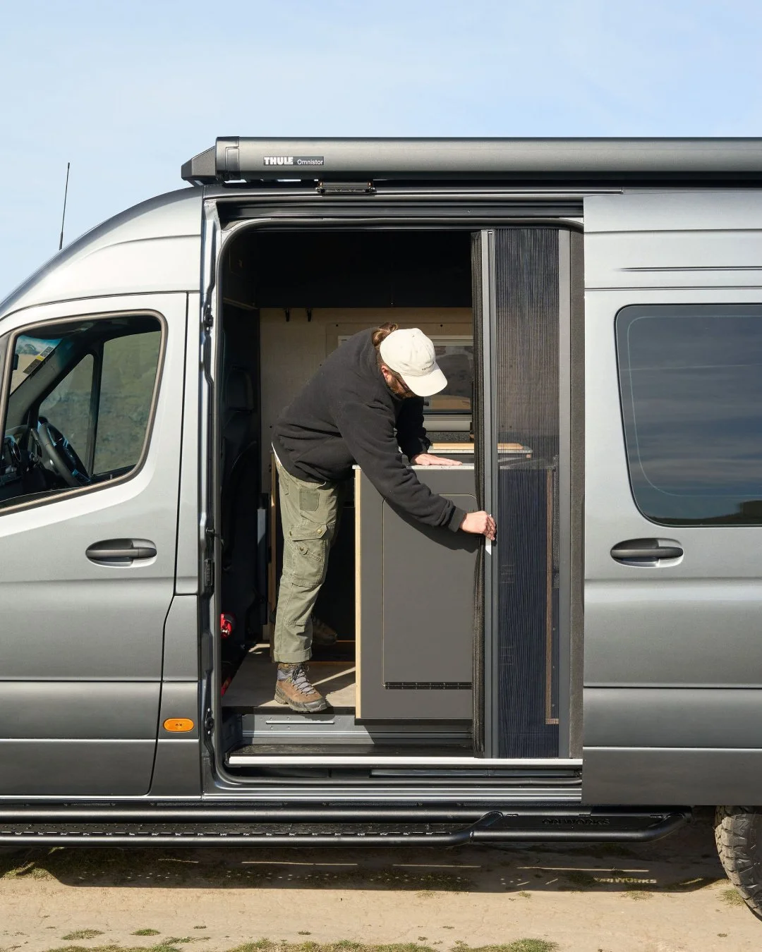 There is nothing quite like parking up, opening the big sliding door, and letting the fresh evening air roll in. The downside? Sandflies joining the party. 🦟❌

Our latest Mercedes Sprinter custom conversion owners wanted all the natural light and ai