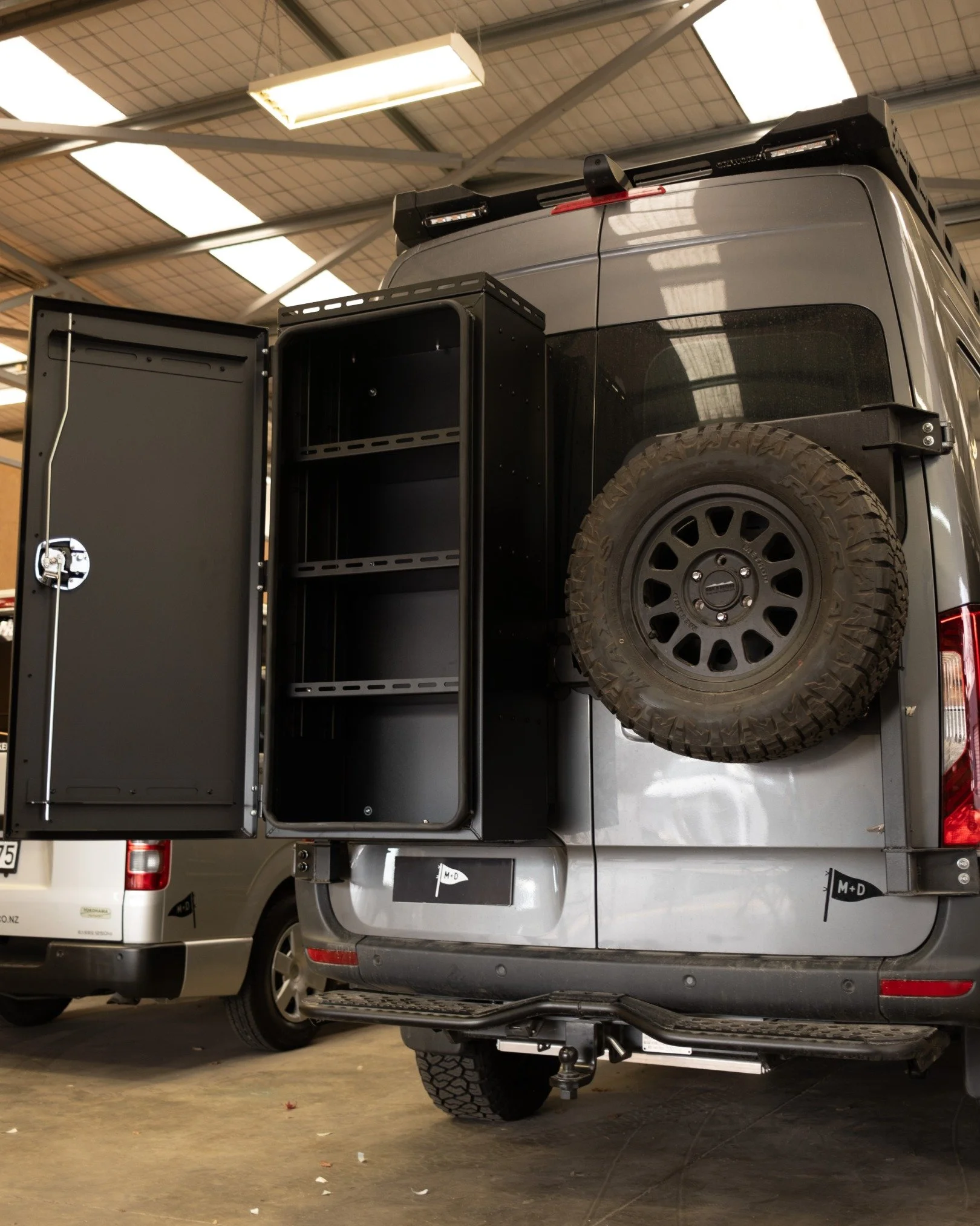 Behind the scenes:

This rear carrier box is the latest exterior accessory made by @oriworksnz. 

This box is waterproof with adjustable shelving and perfect for storing anything you don&rsquo;t want to keep inside the van. Think muddy boots, wet jac