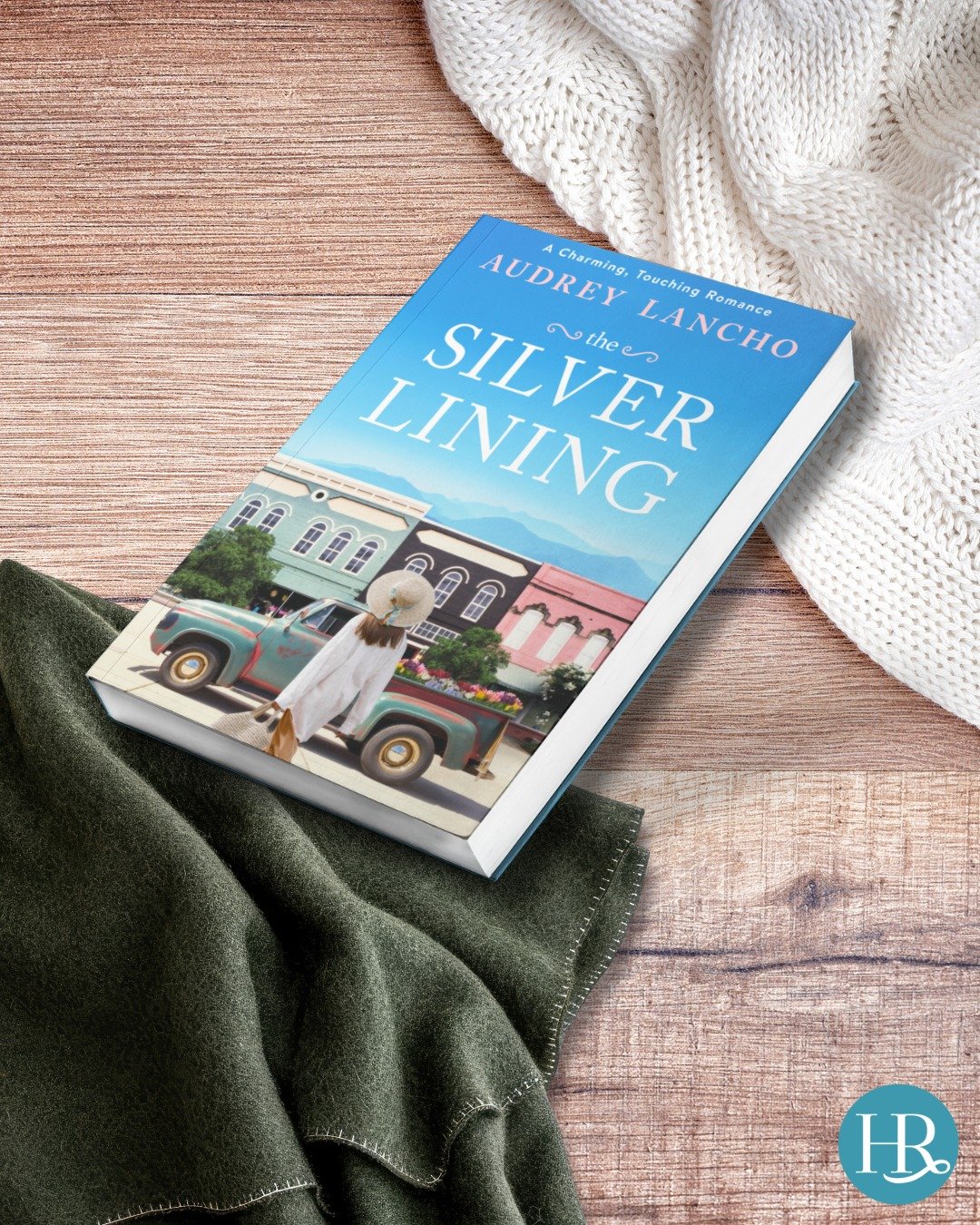 For tonight's cozy night in, we&rsquo;re bundling up with a fleece-lined sweater, drinking a pumpkin spice latte, and reading The Silver Lining by @audreylancho! Who&rsquo;s joining us? 

#contemporaryromance #sweetromance #cozyreads #romancereaderso