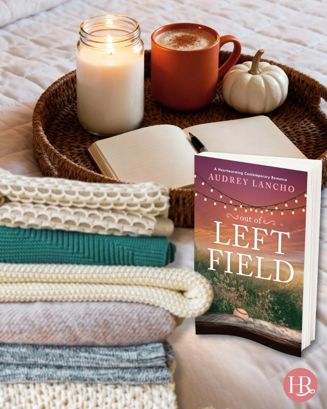 It&rsquo;s the start of a new week, which means it&rsquo;s time to curl up with another romance novel! Today&rsquo;s accessories include a mug of chai tea, a candle that smells like fall, a pile of fuzzy blankets, and Out of Left Field by @audreylanc