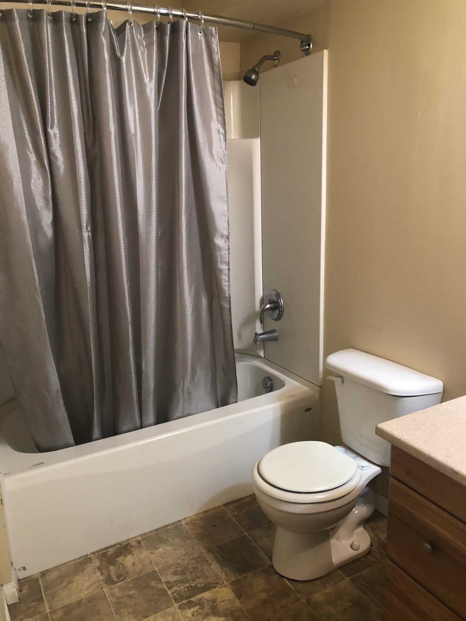 pinecrest-apartments-sparwood-bathroom-toilet-shower.jpg