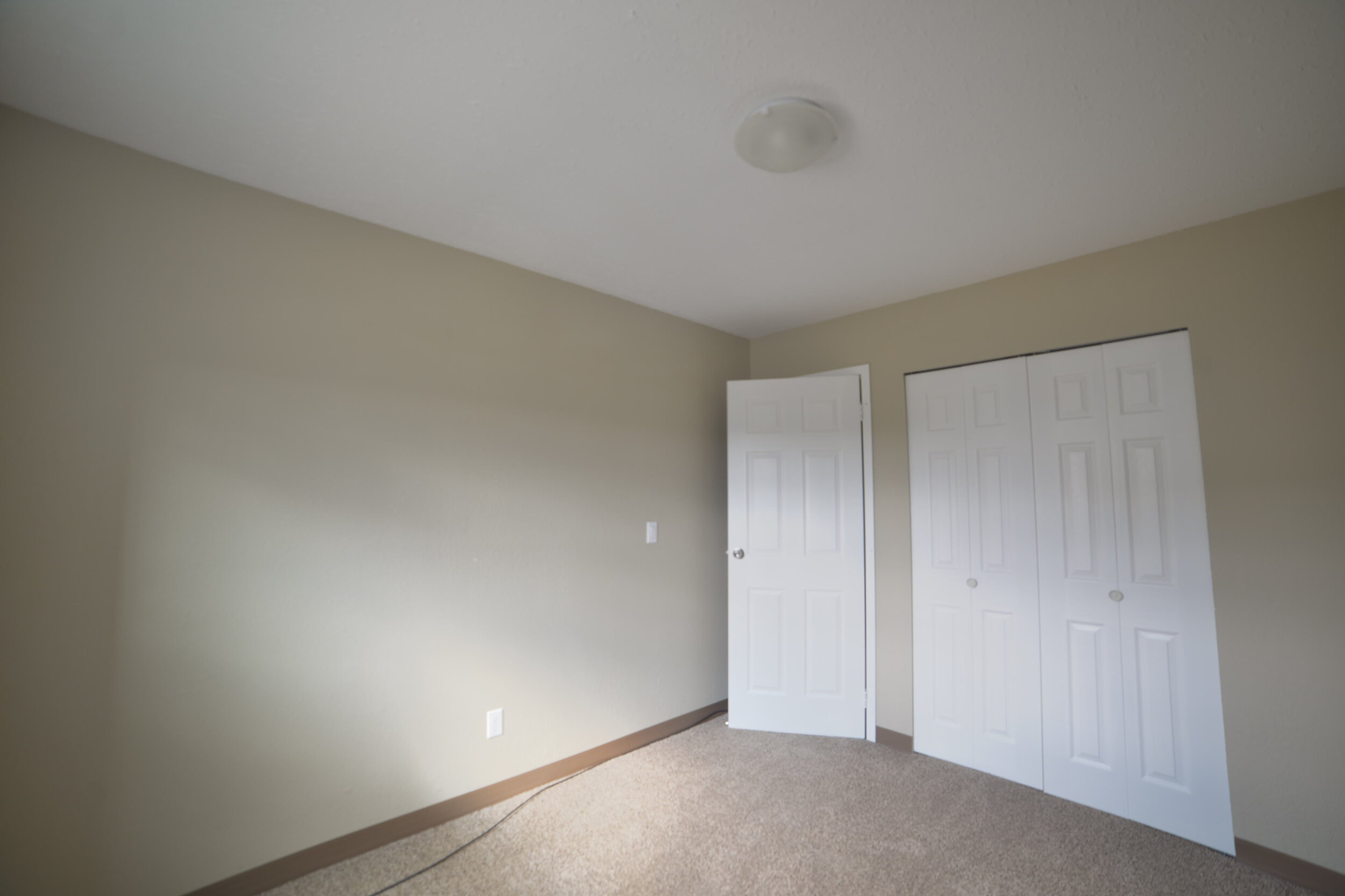 sunridge-apartments-10901-15-st-dawson-creek-second-bedroom.JPG