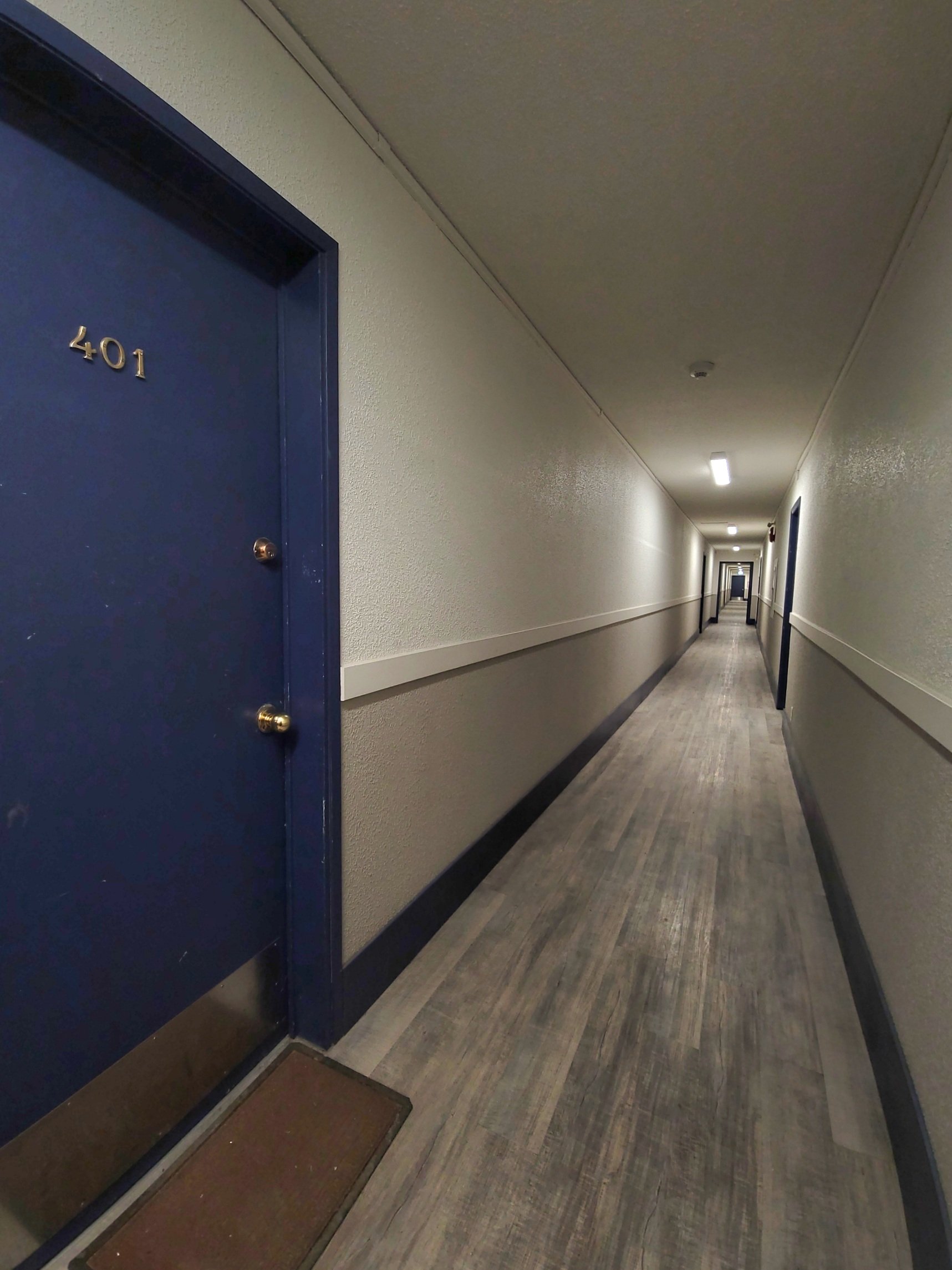 ambassador-apartments-10023-97-ave-fort-st-john-apartment-building-common-area-hallway.jpg