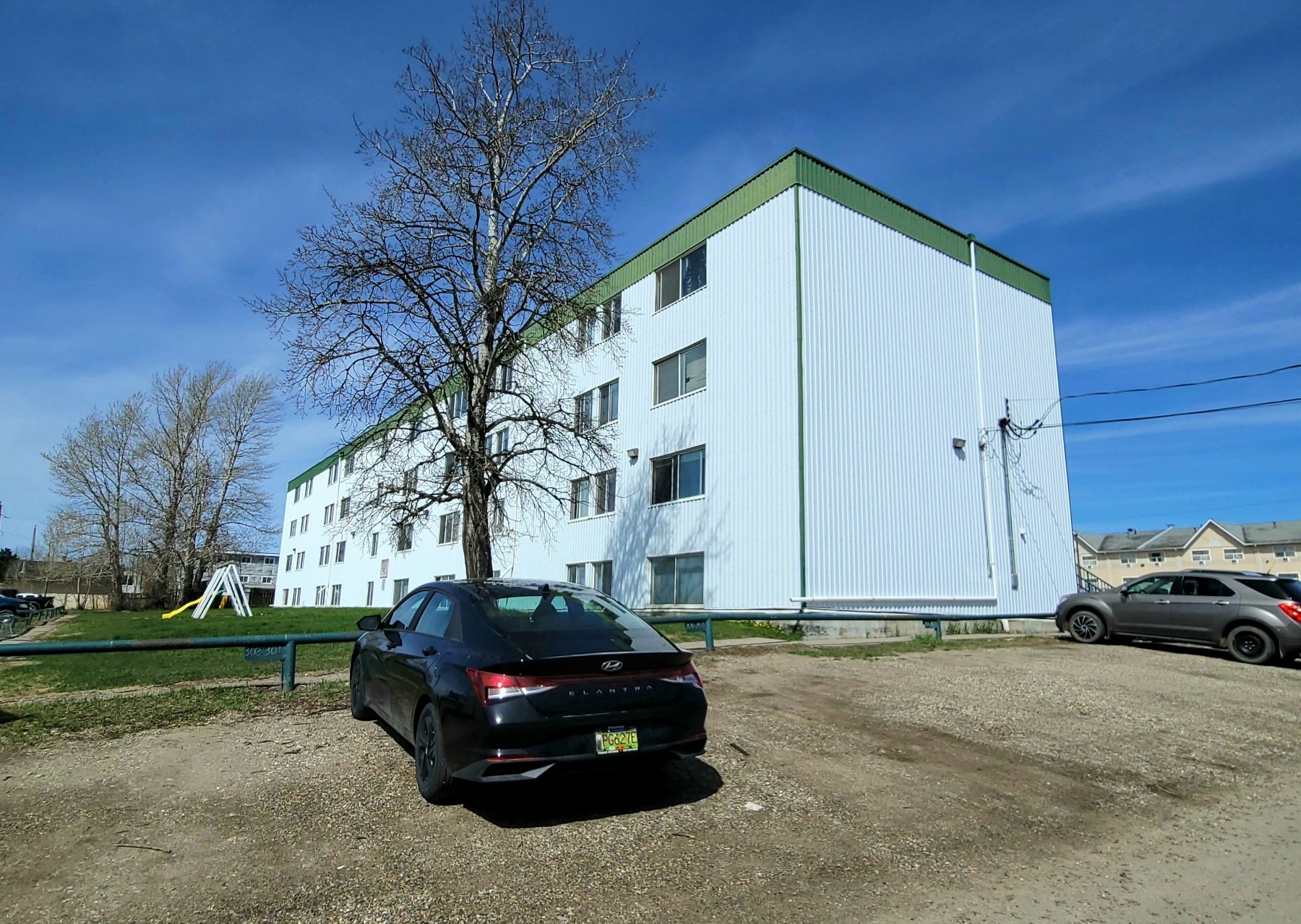 ambassador-apartments-10023-97-ave-fort-st-john-apartment-building-side.jpg