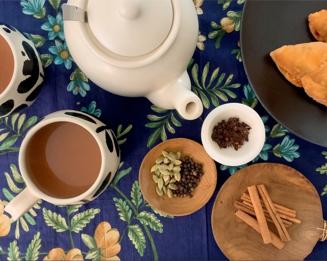 Vintage blue pot of traditional indian masala chai tea with