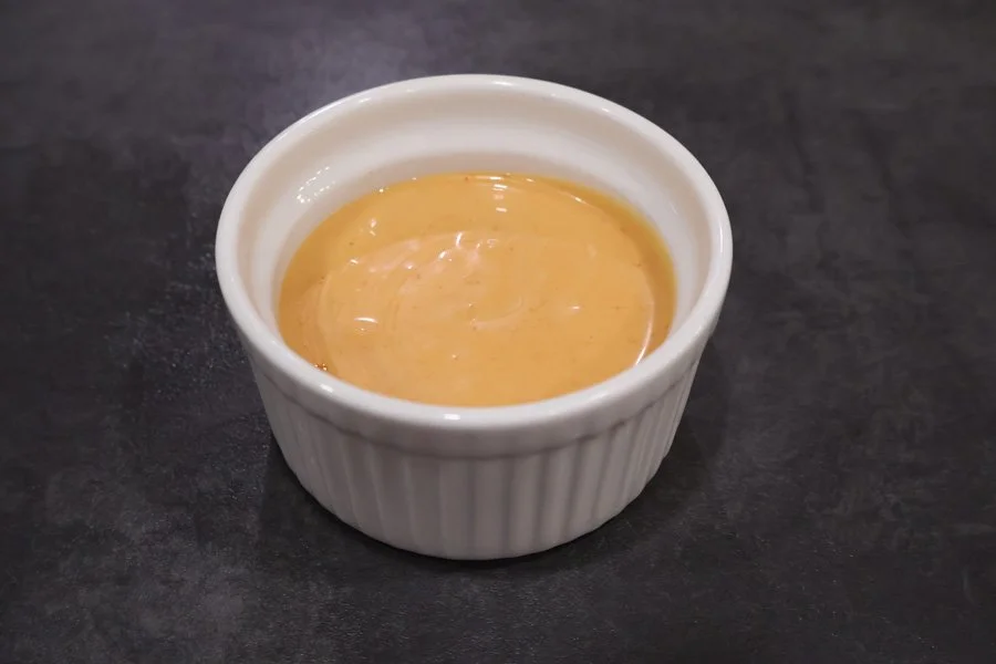 closeup of ramekin with umami sauce