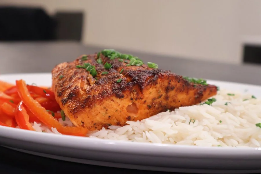 photo of air fried salmon with rice and peppers