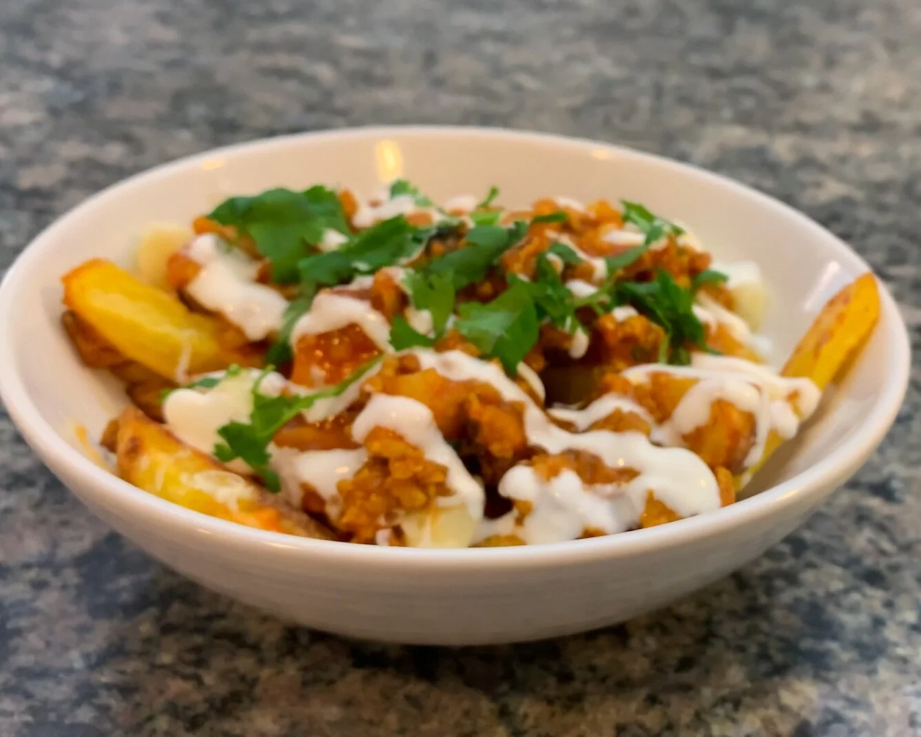 IndianFusion Chicken Keema Poutine Spiced Chicken Gravy w/ Minced