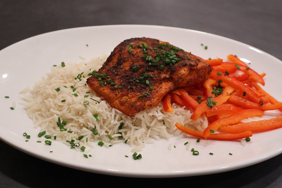 picture of air fryer salmon over rice