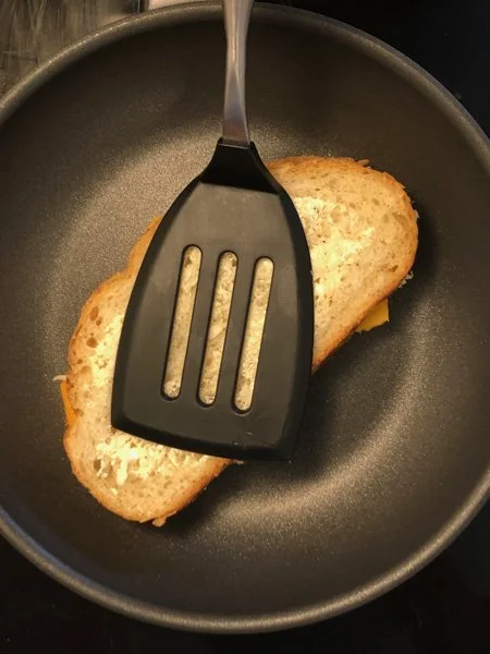 pressing down with spatula