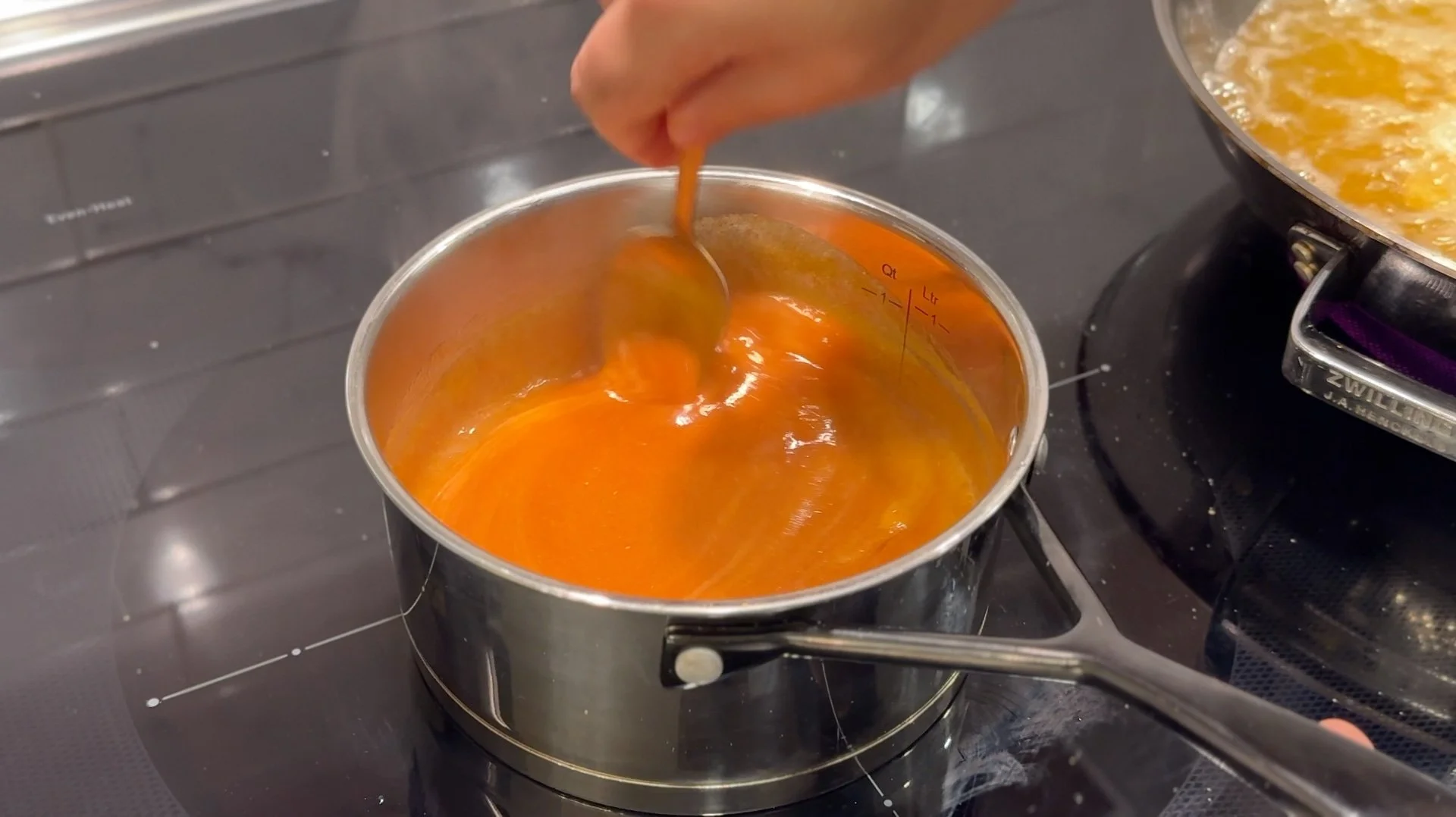 mixing buffalo sauce