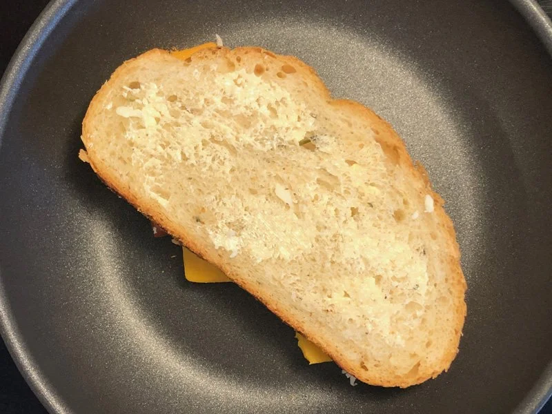 placing sandwich on pan