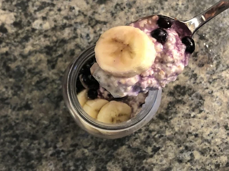 bite of blueberry cheesecake overnight oats